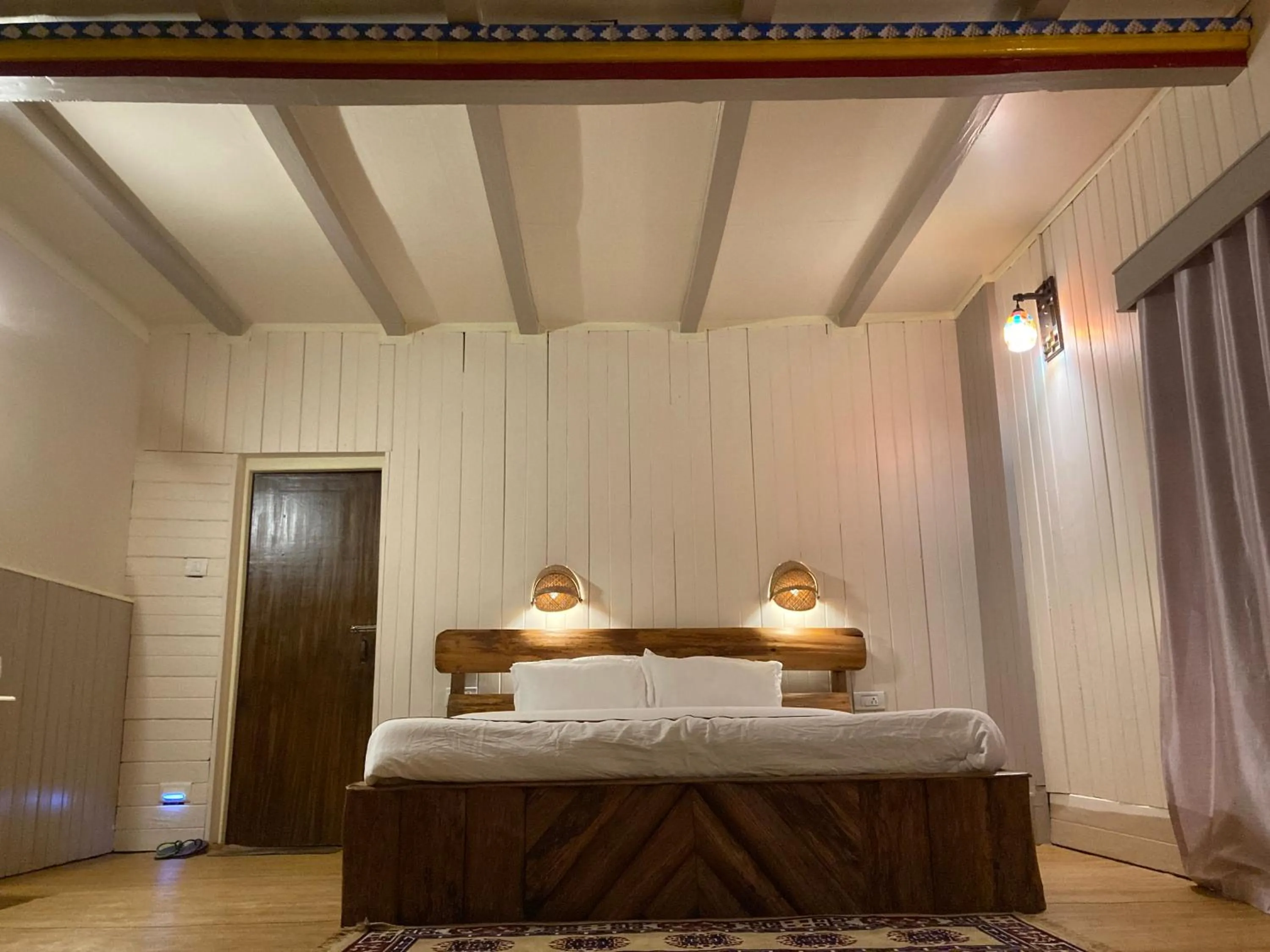 Bed in MayaTels - Maya Eco Huts, Pelling