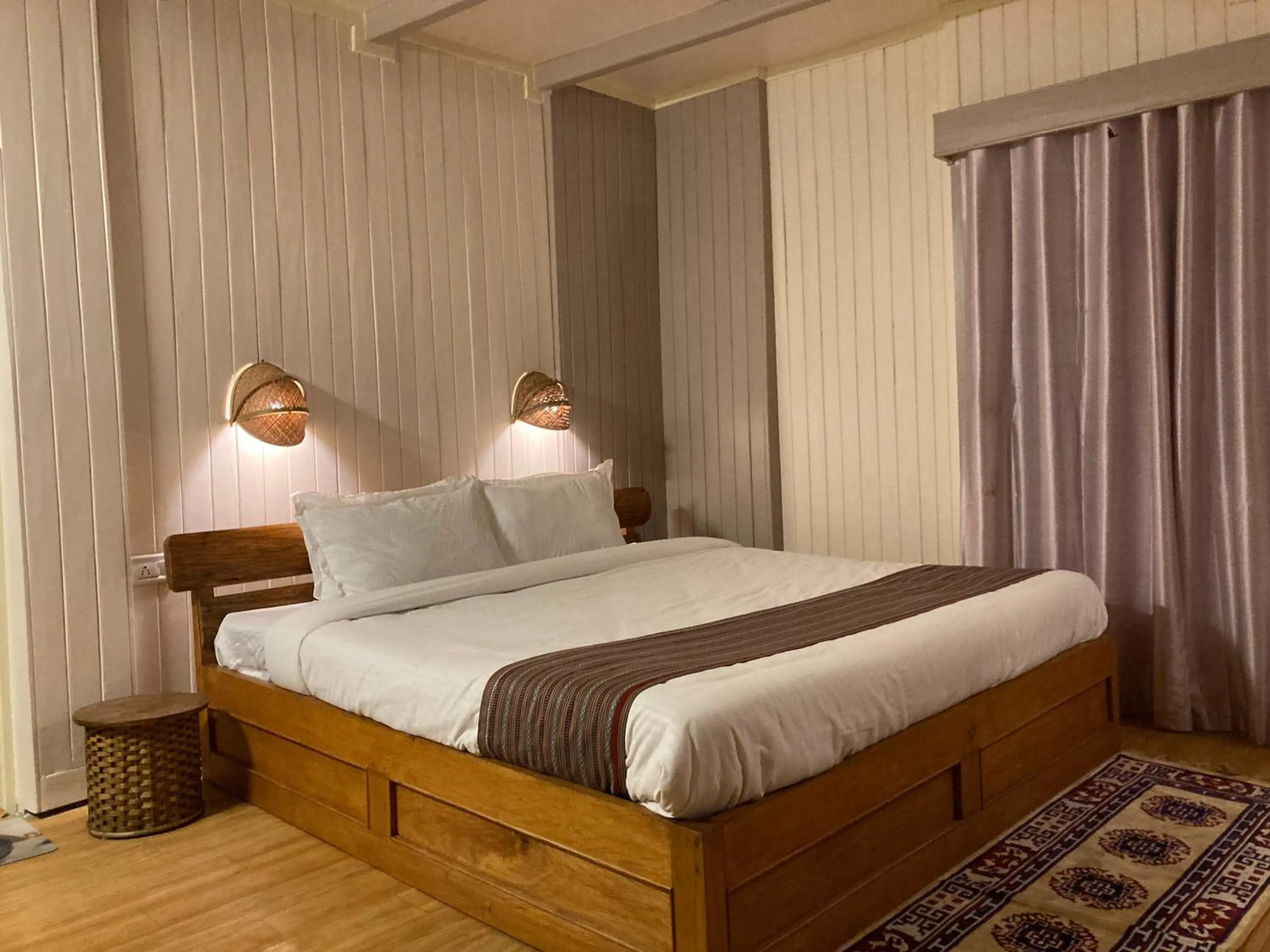 Bed in MayaTels - Maya Eco Huts, Pelling