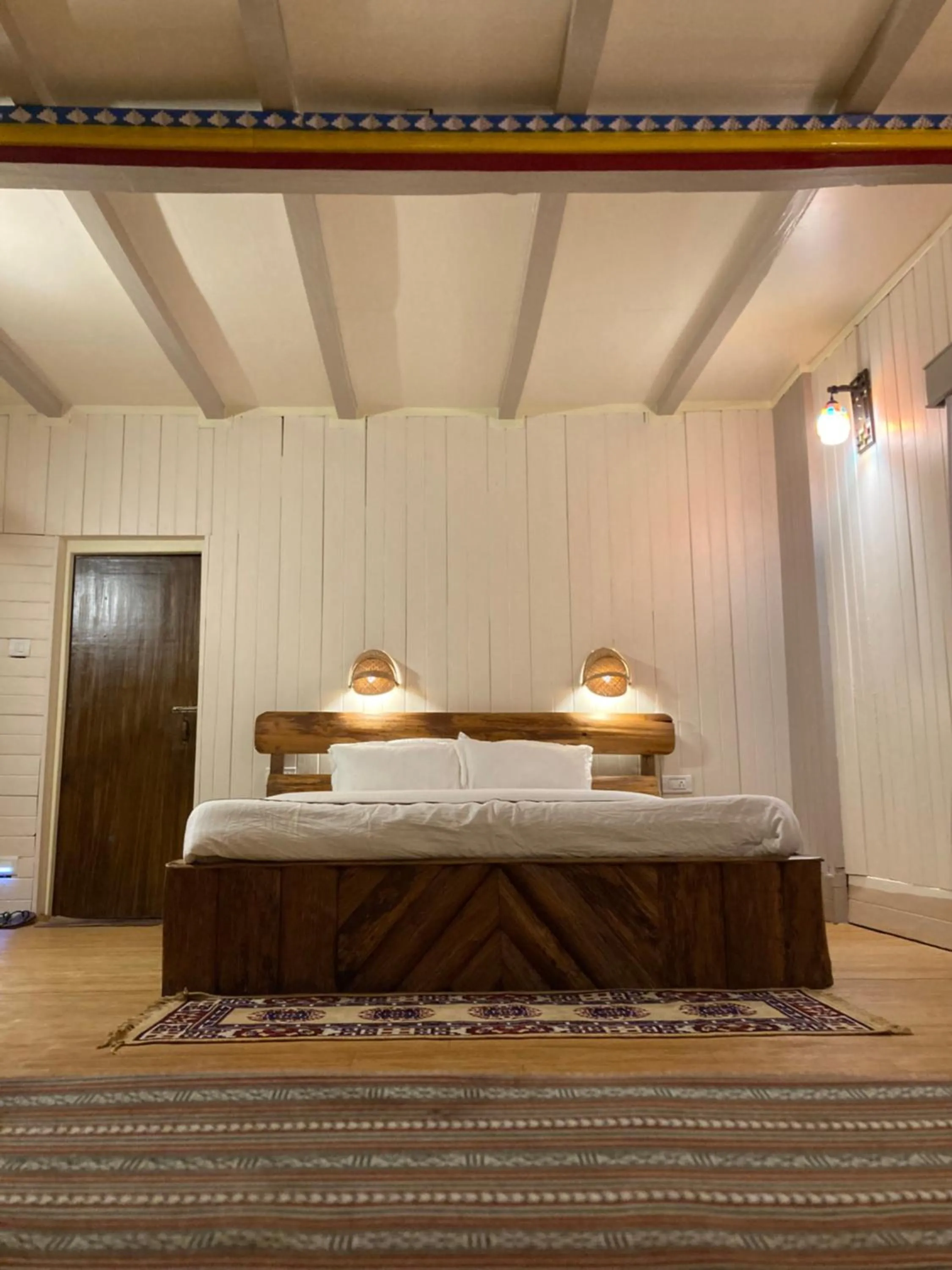 Bed in MayaTels - Maya Eco Huts, Pelling