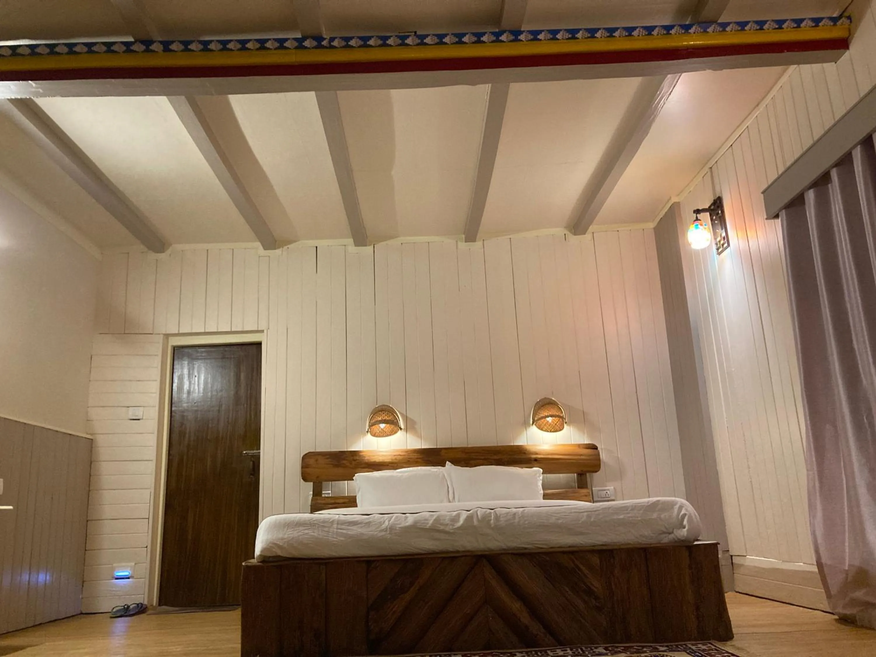 Bed in MayaTels - Maya Eco Huts, Pelling