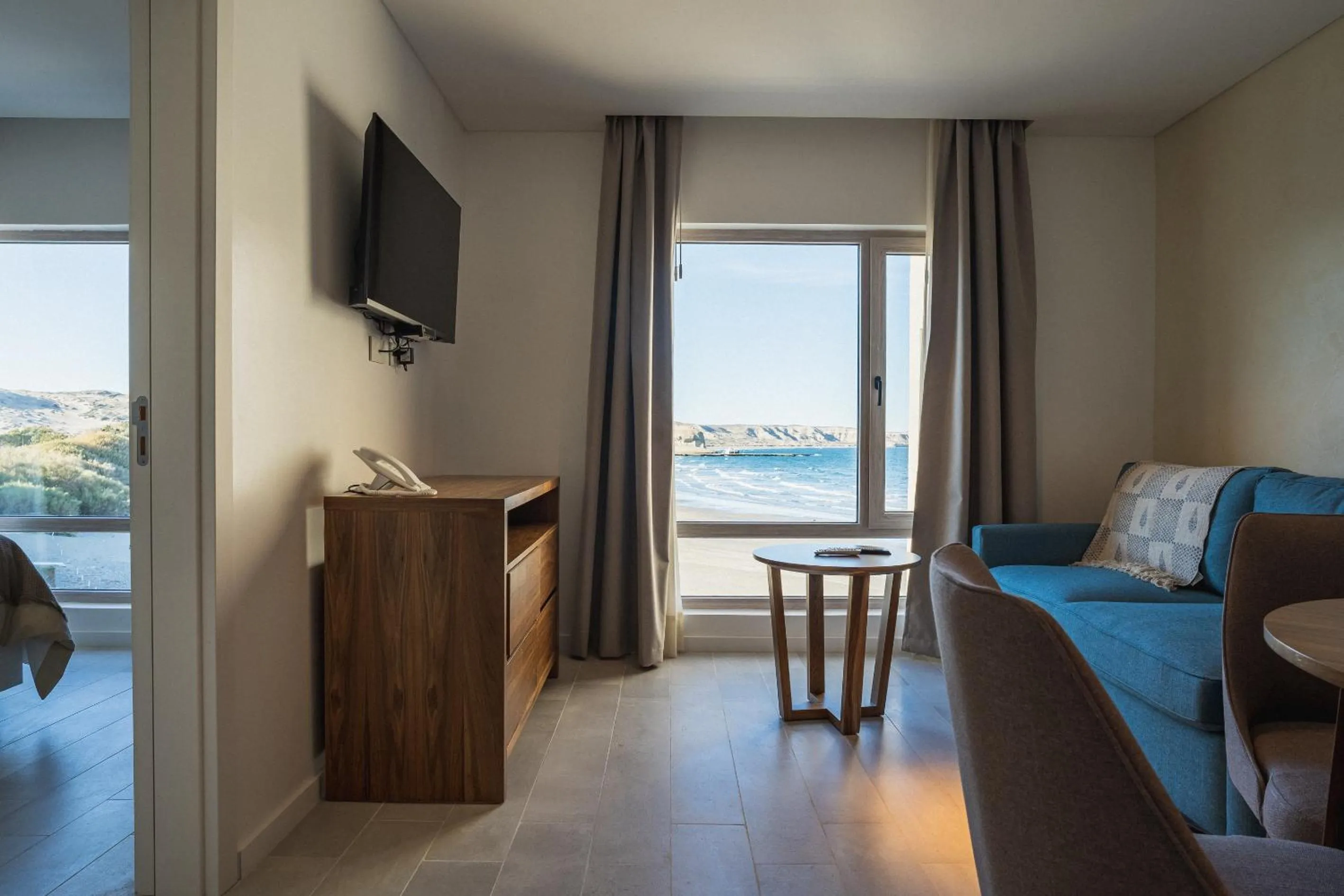 Communal lounge/ TV room in Rayentray Puerto Piramides