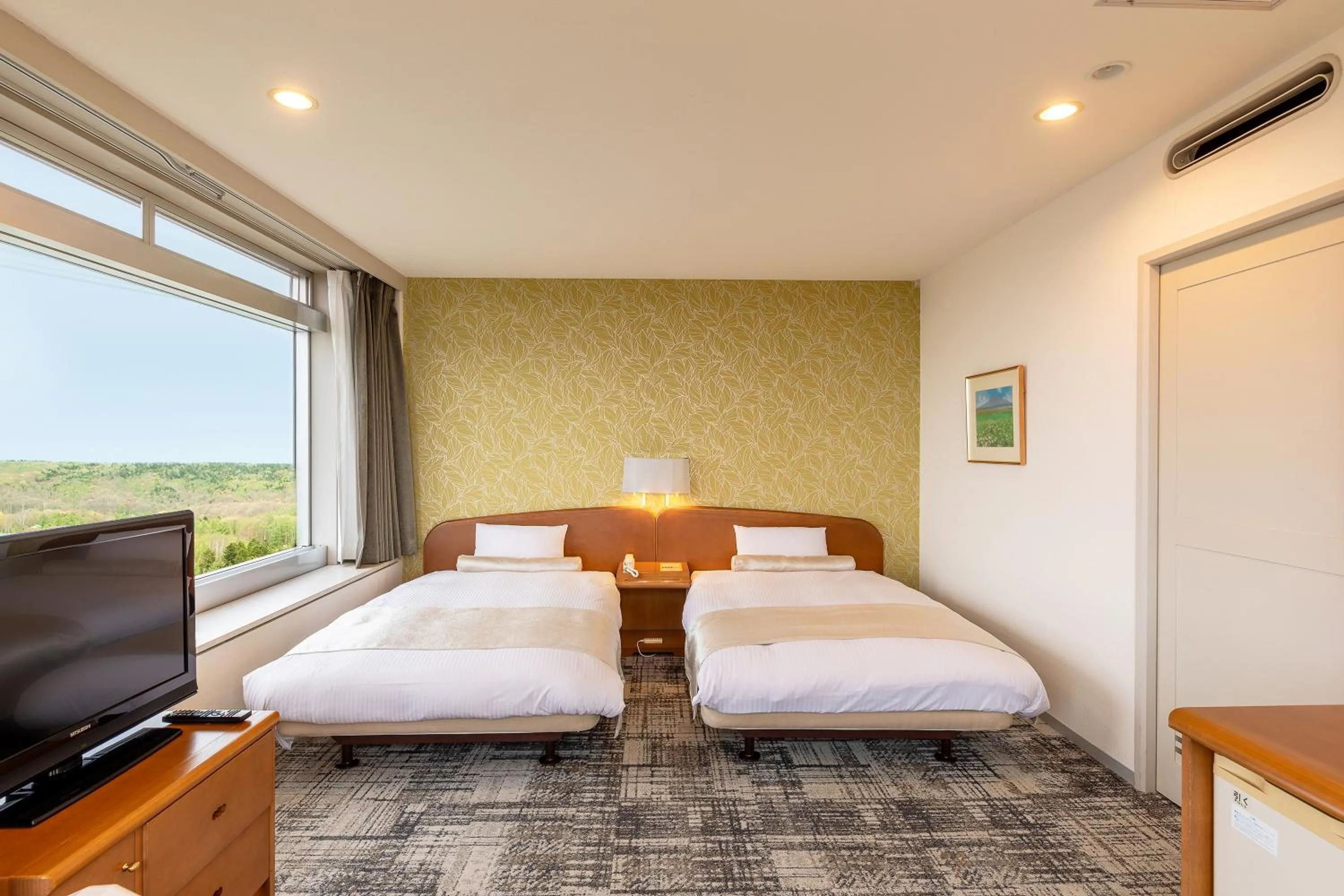 Bed in Kitahiroshima Classe Hotel