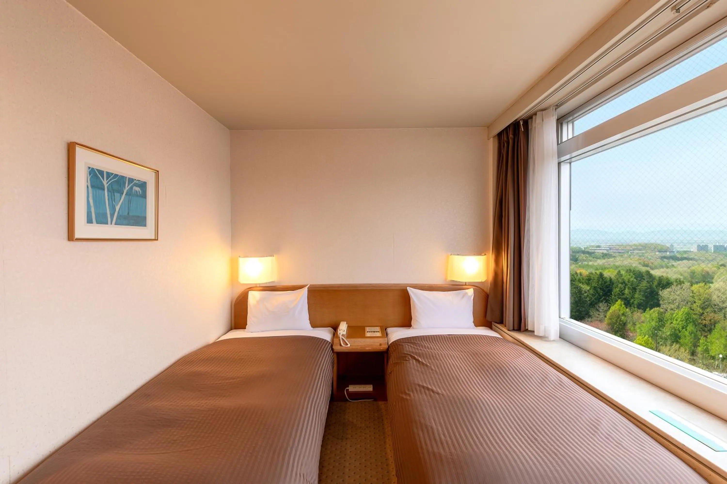 Bed in Kitahiroshima Classe Hotel