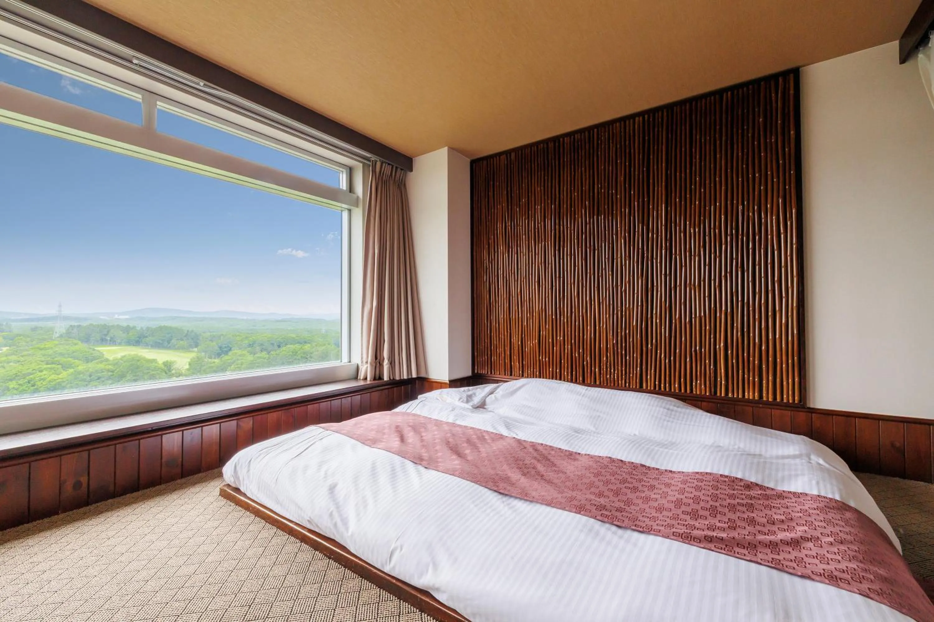 Bed in Kitahiroshima Classe Hotel