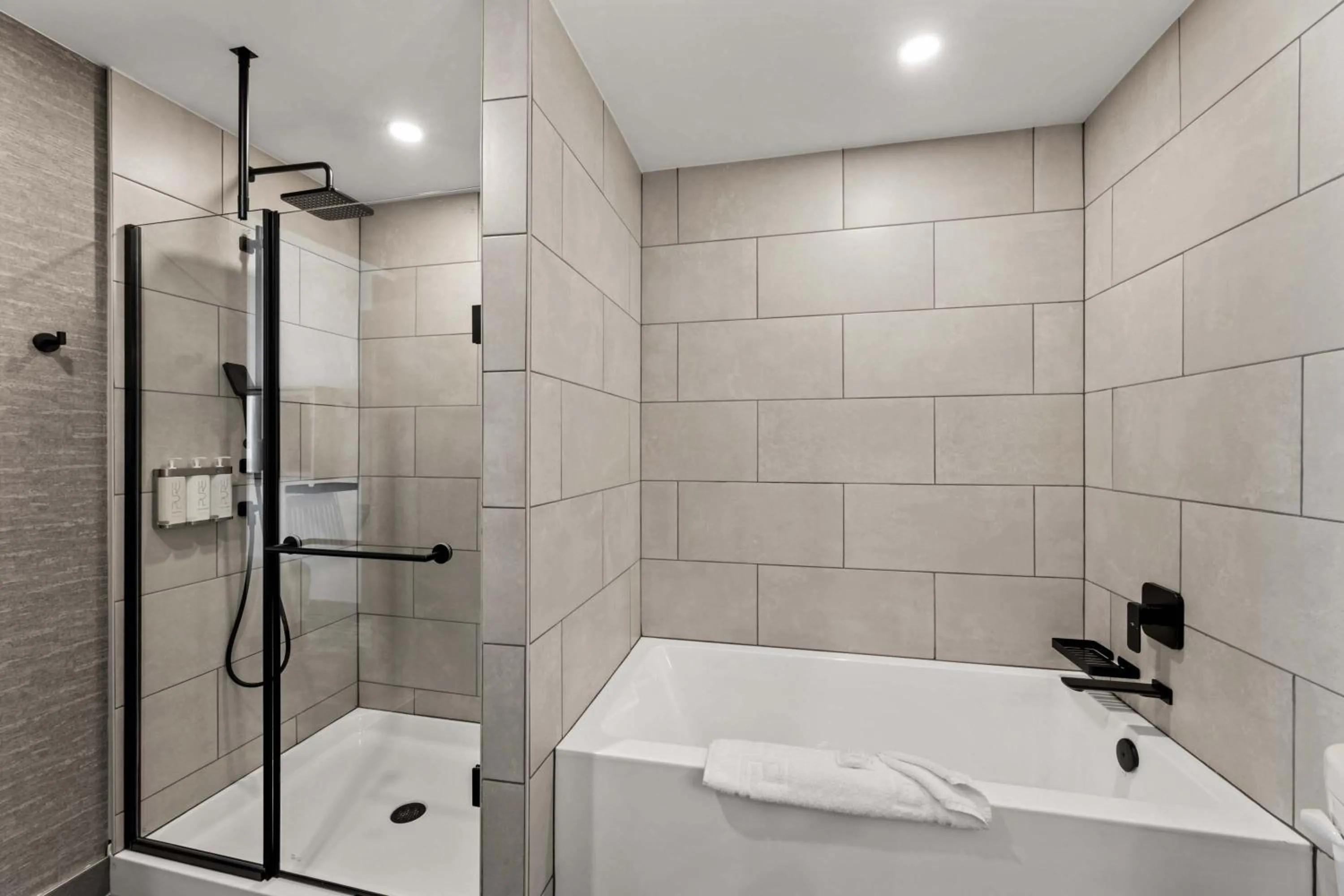 Bathroom in Sandman Signature Dallas Las Colinas Hotel & Suites