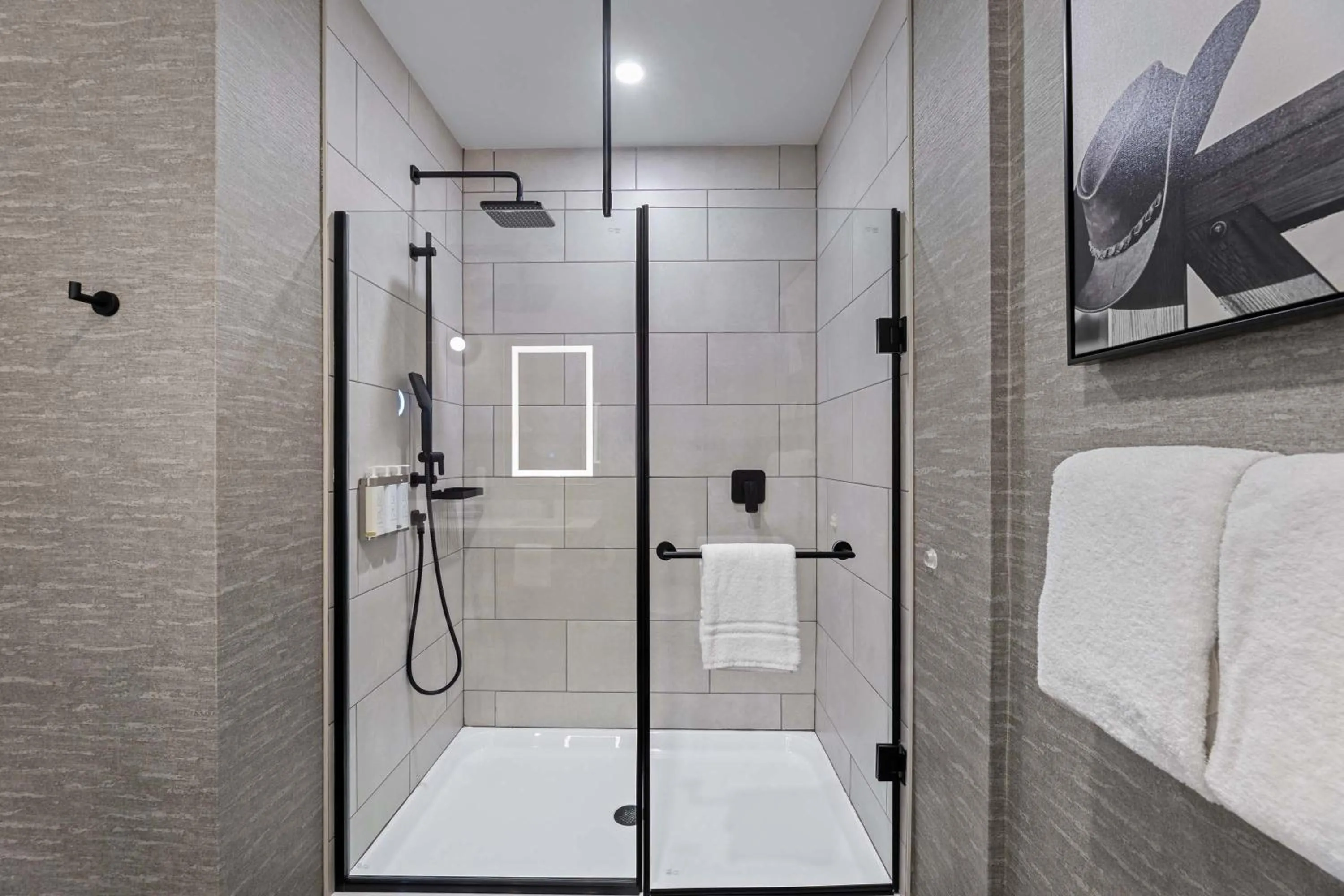 Bathroom in Sandman Signature Dallas Las Colinas Hotel & Suites