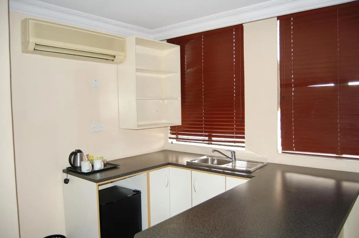 Communal kitchen in Owu Crown Hotel Ibadan