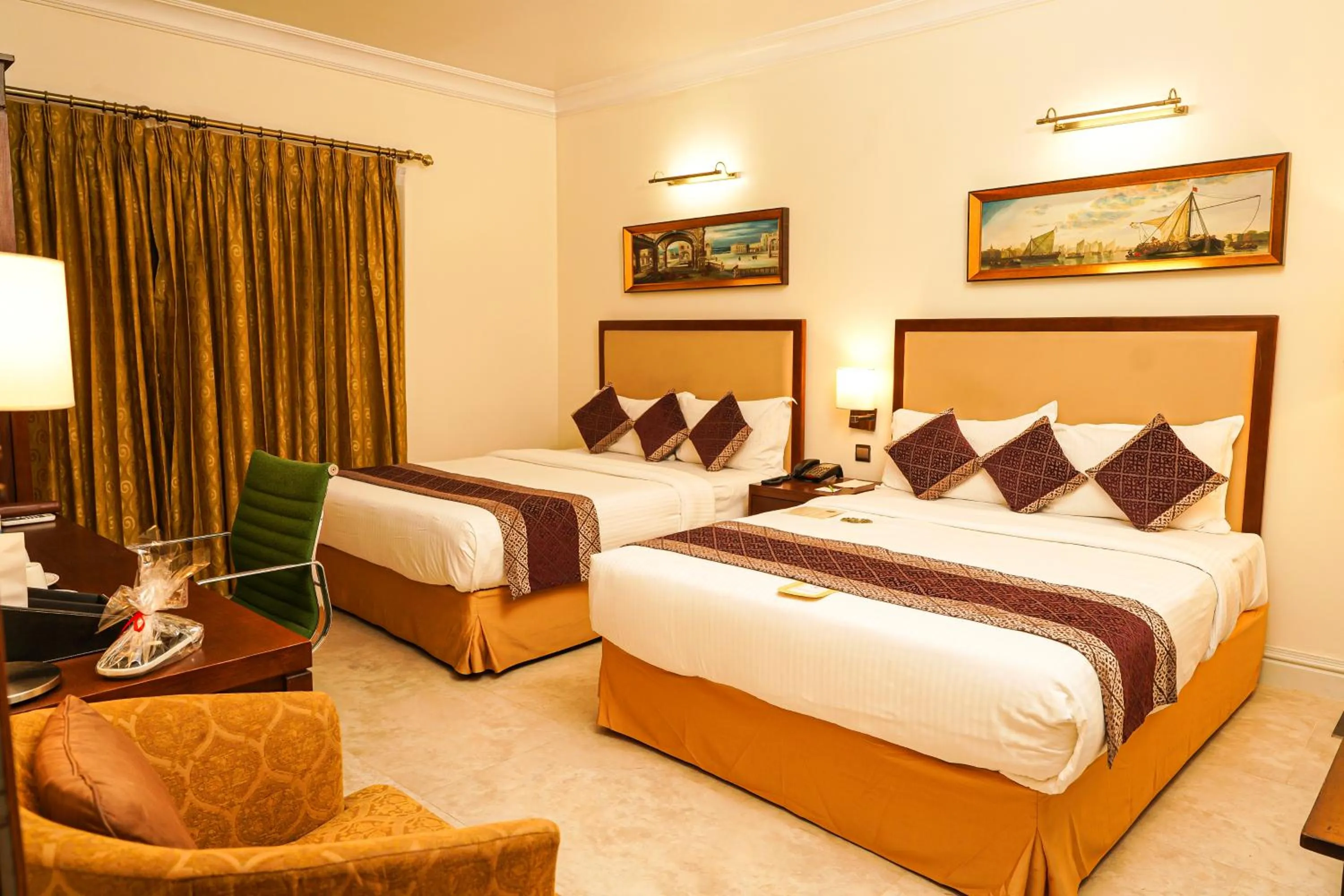 Bed in Royal Park Residence Hotel