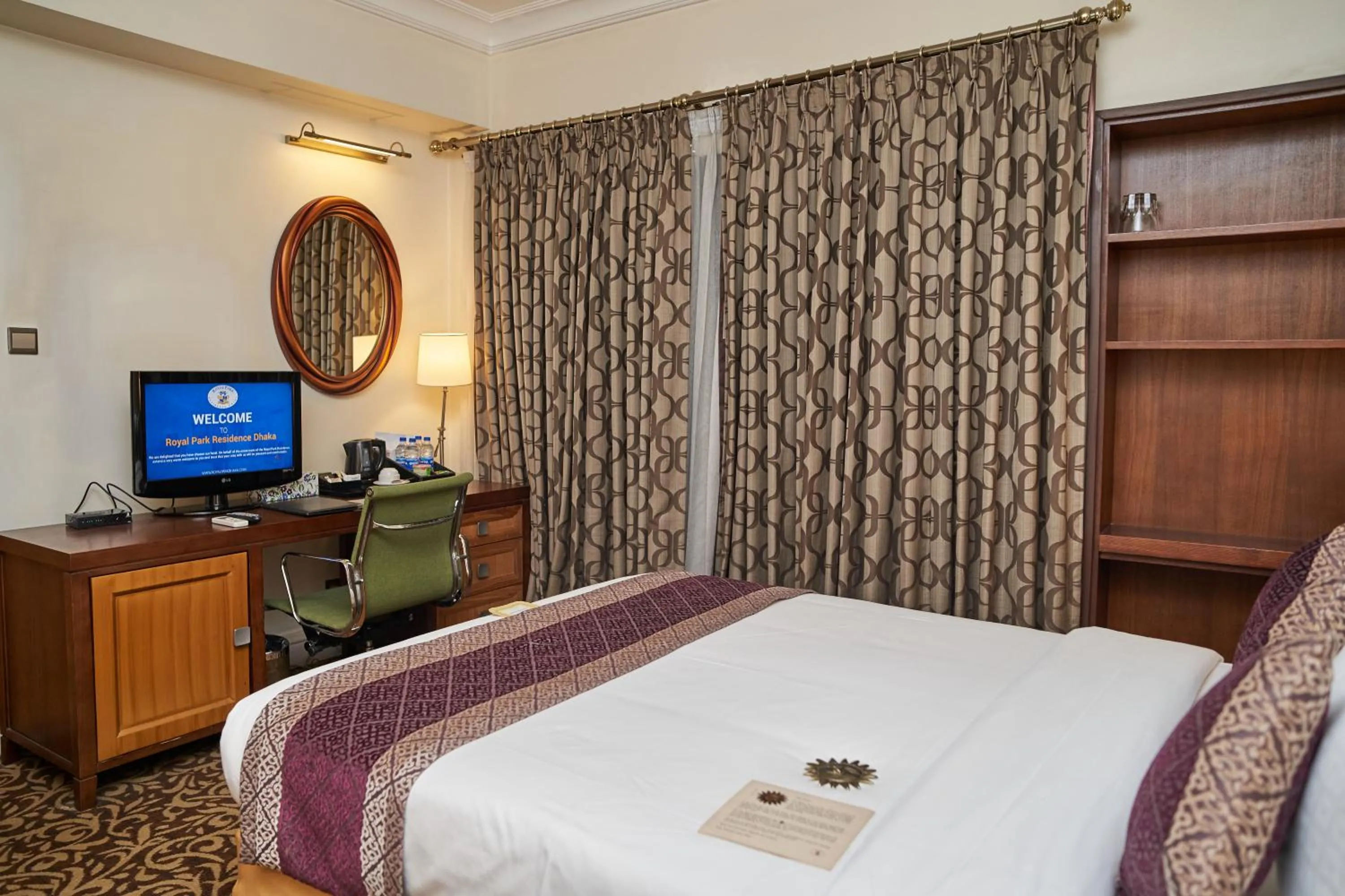 Bed in Royal Park Residence Hotel