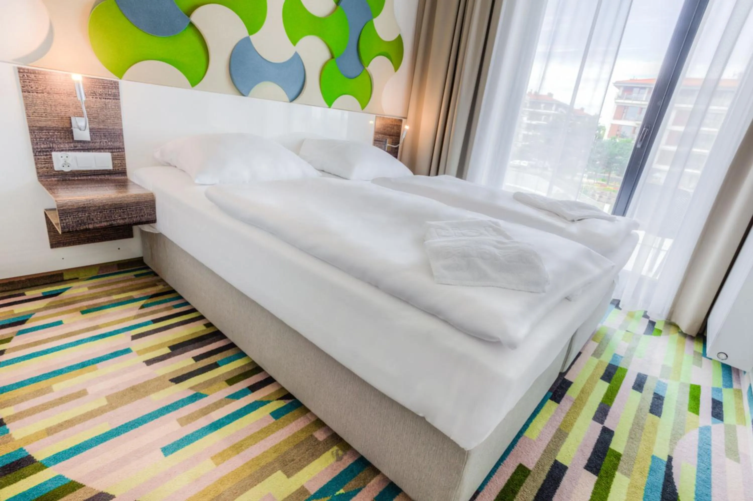 Bed in Baltic Park Molo Apartments by Zdrojowa
