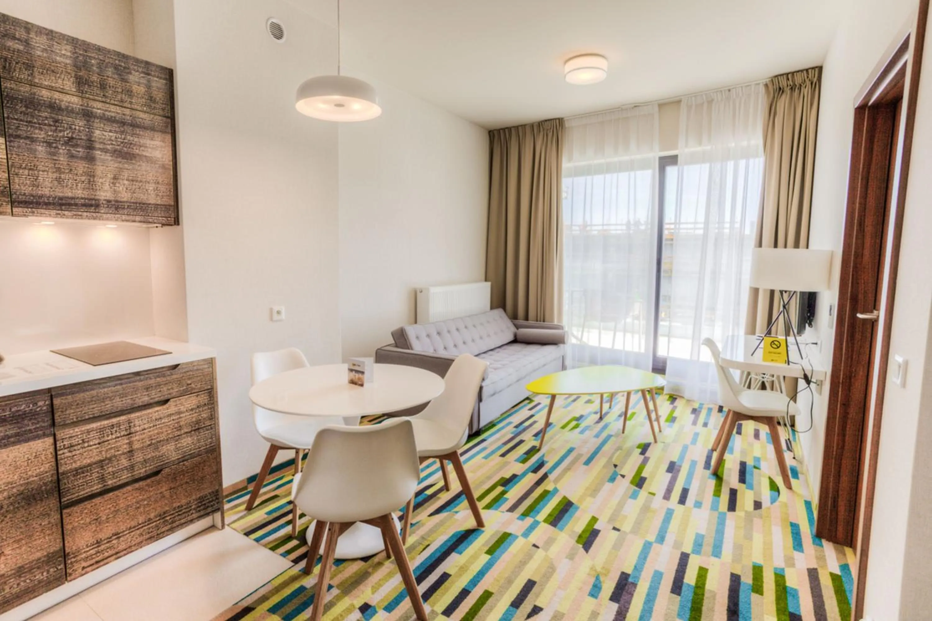 Living room, Bed in Baltic Park Molo Apartments by Zdrojowa