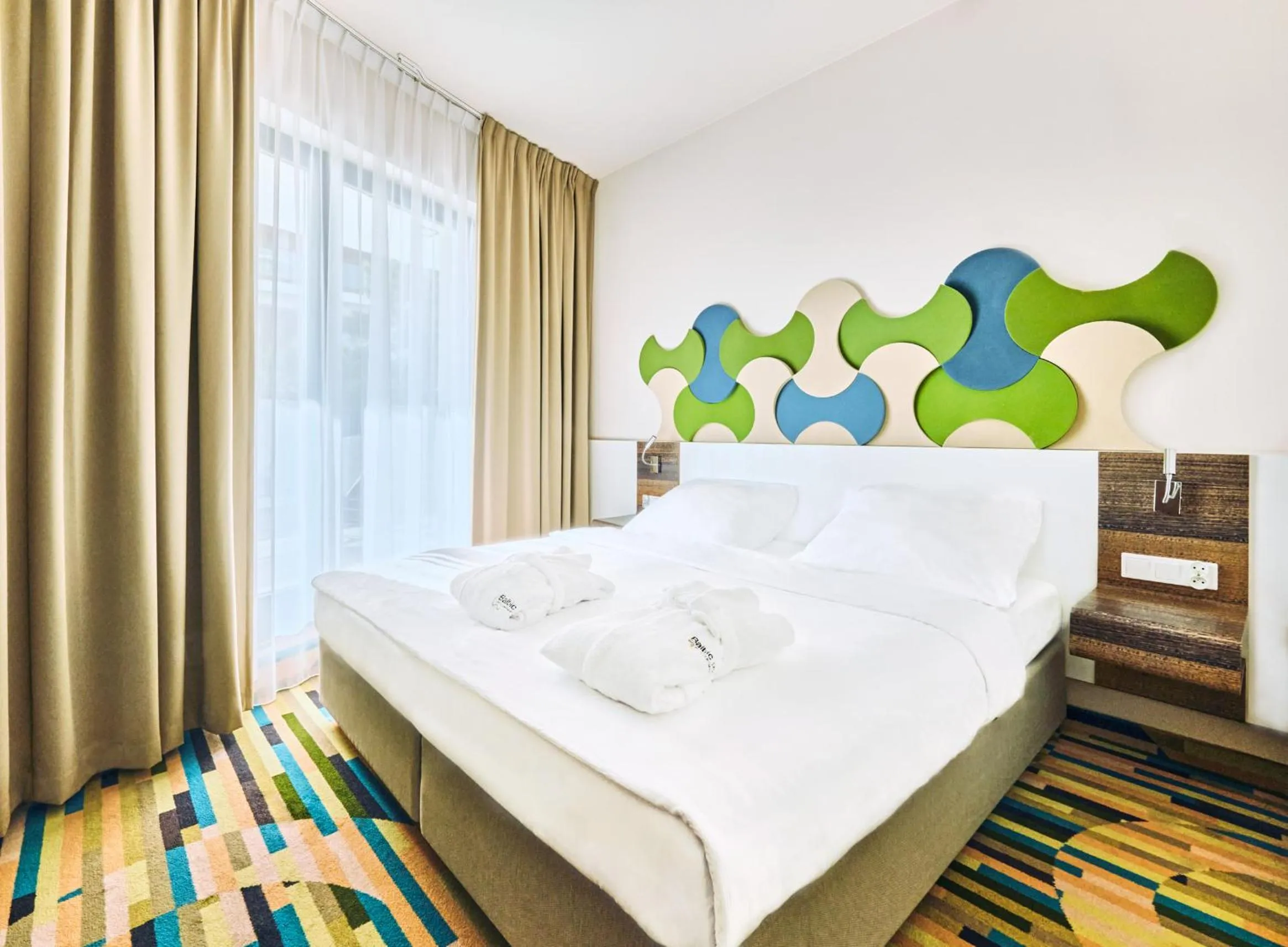 Bed in Baltic Park Molo Apartments by Zdrojowa