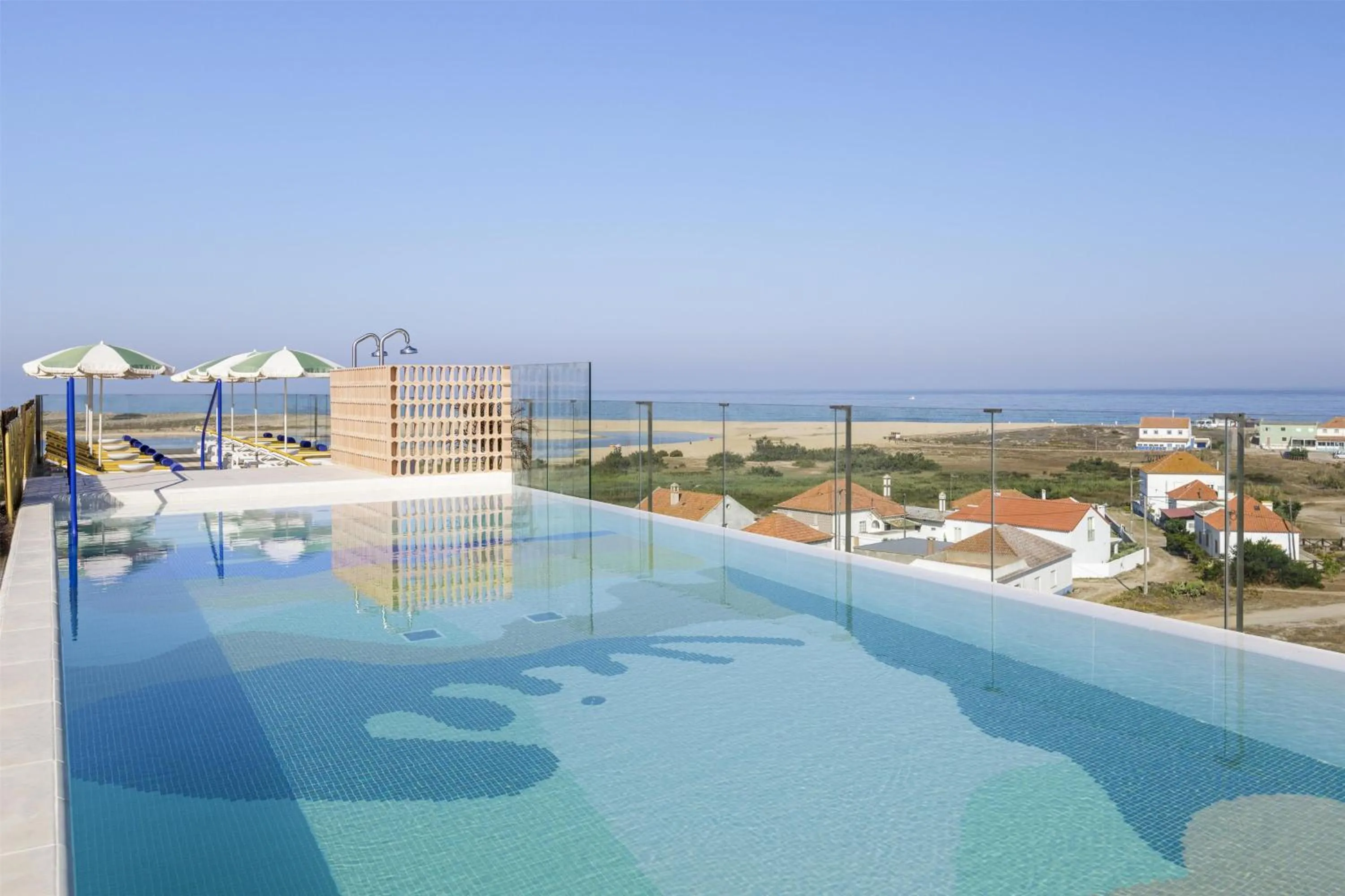 Pool view in Amarello Hotel Praia Santo André, Tapestry Collection by Hilton