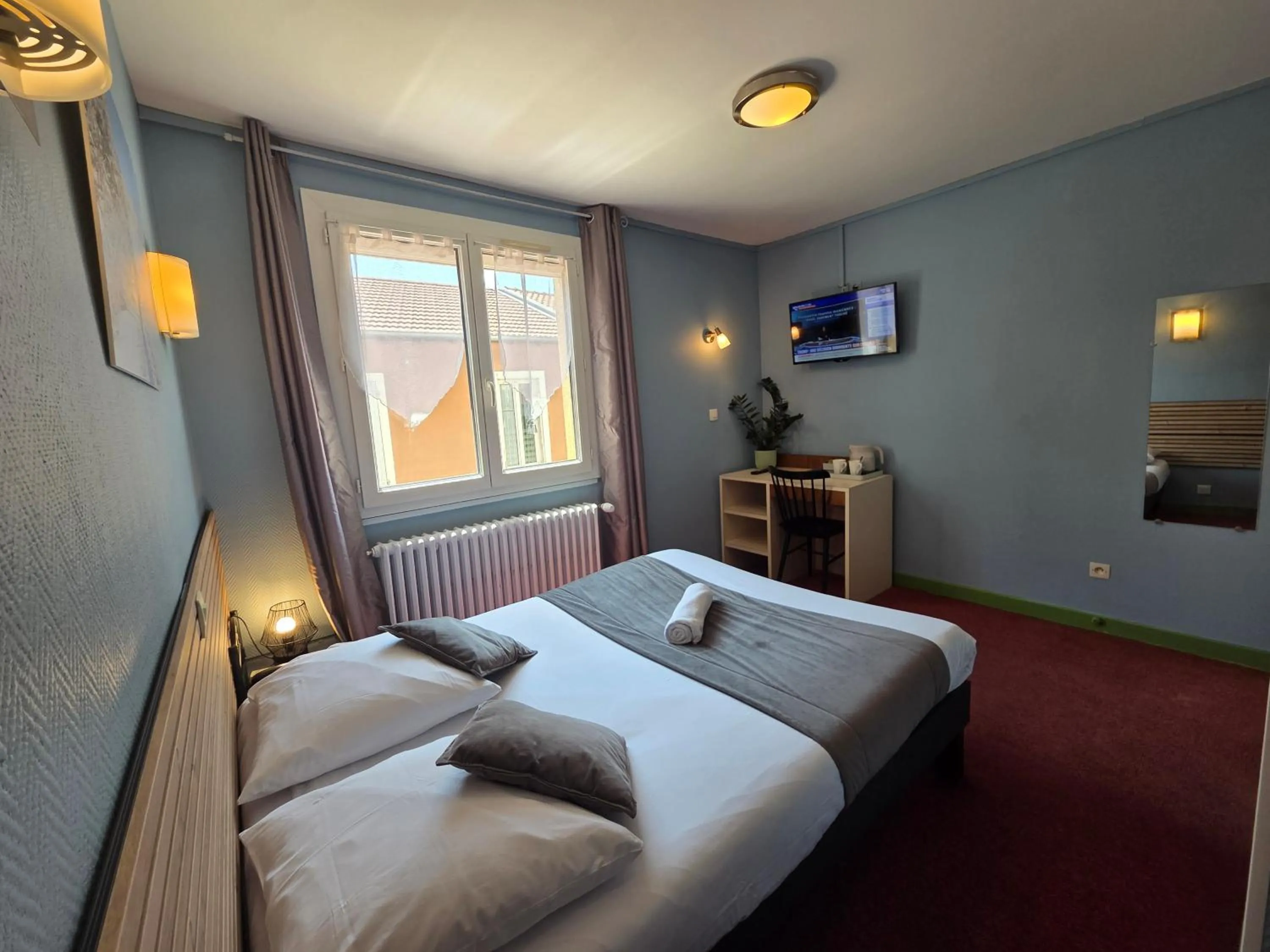 Bed in Hotel Magdeleine