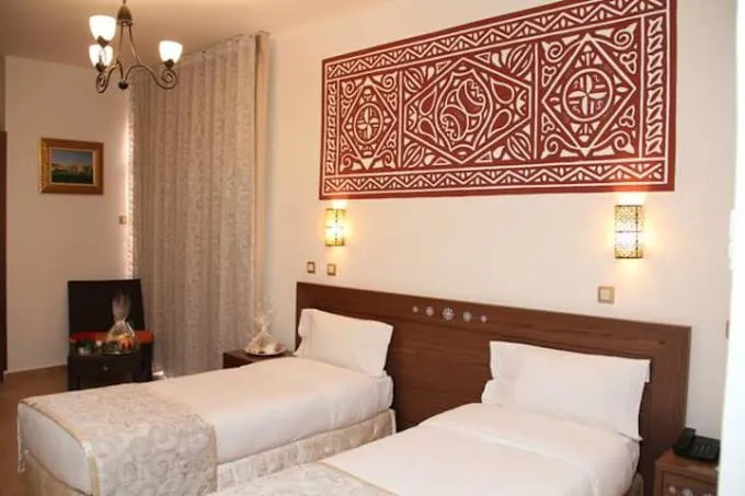 Bed in Hotel Gourara