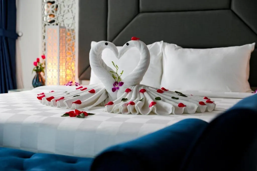 Bed in Le Petit Prince Lakeside Hotel & Rooftop Bar