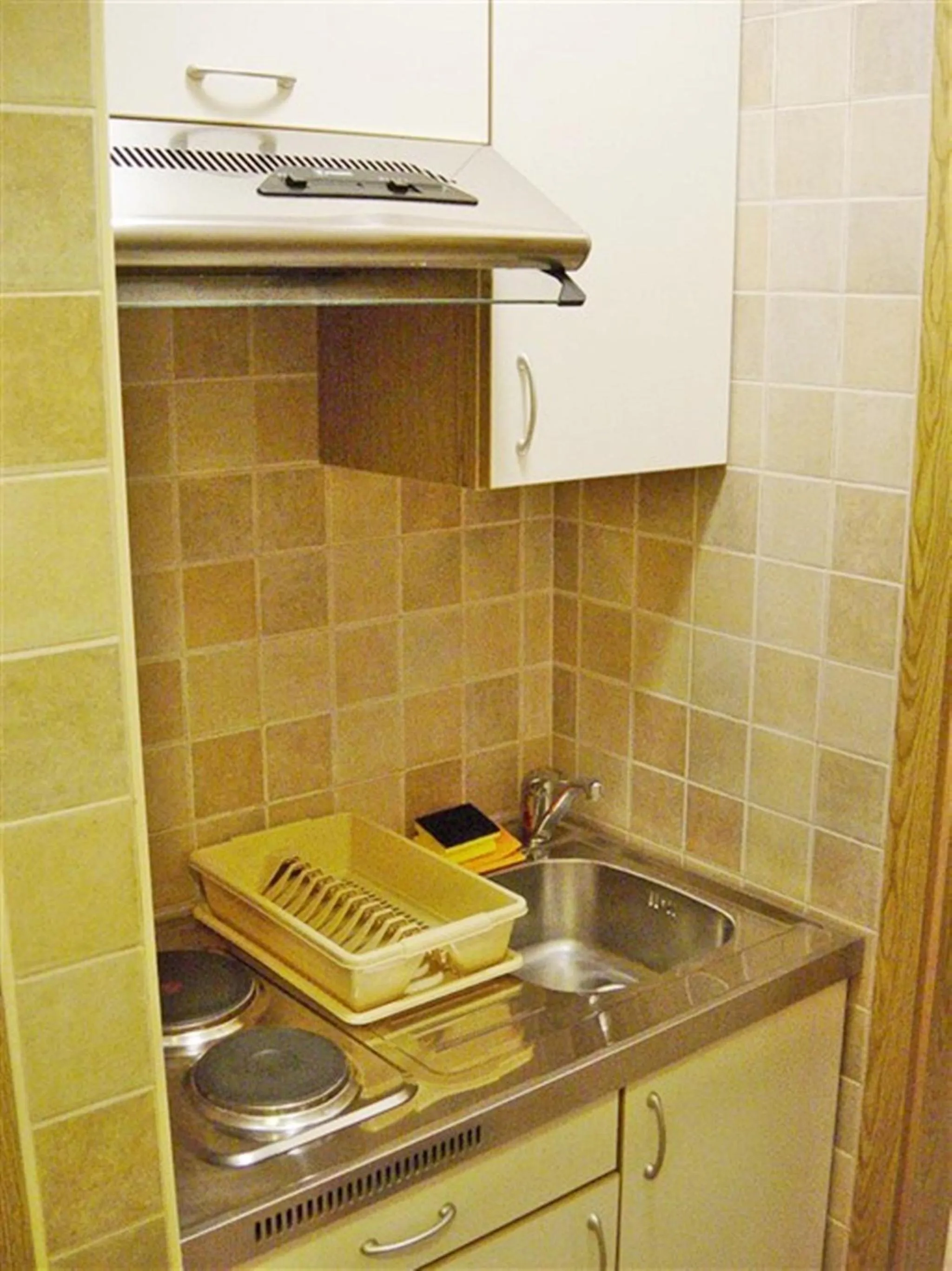 Kitchen or kitchenette in Klarina Apartments