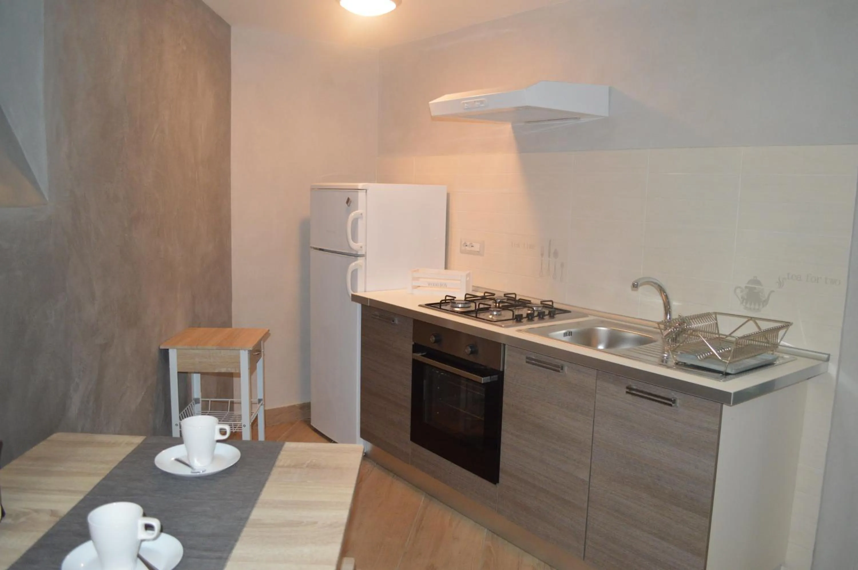Kitchen or kitchenette in Petros rooms&apartments