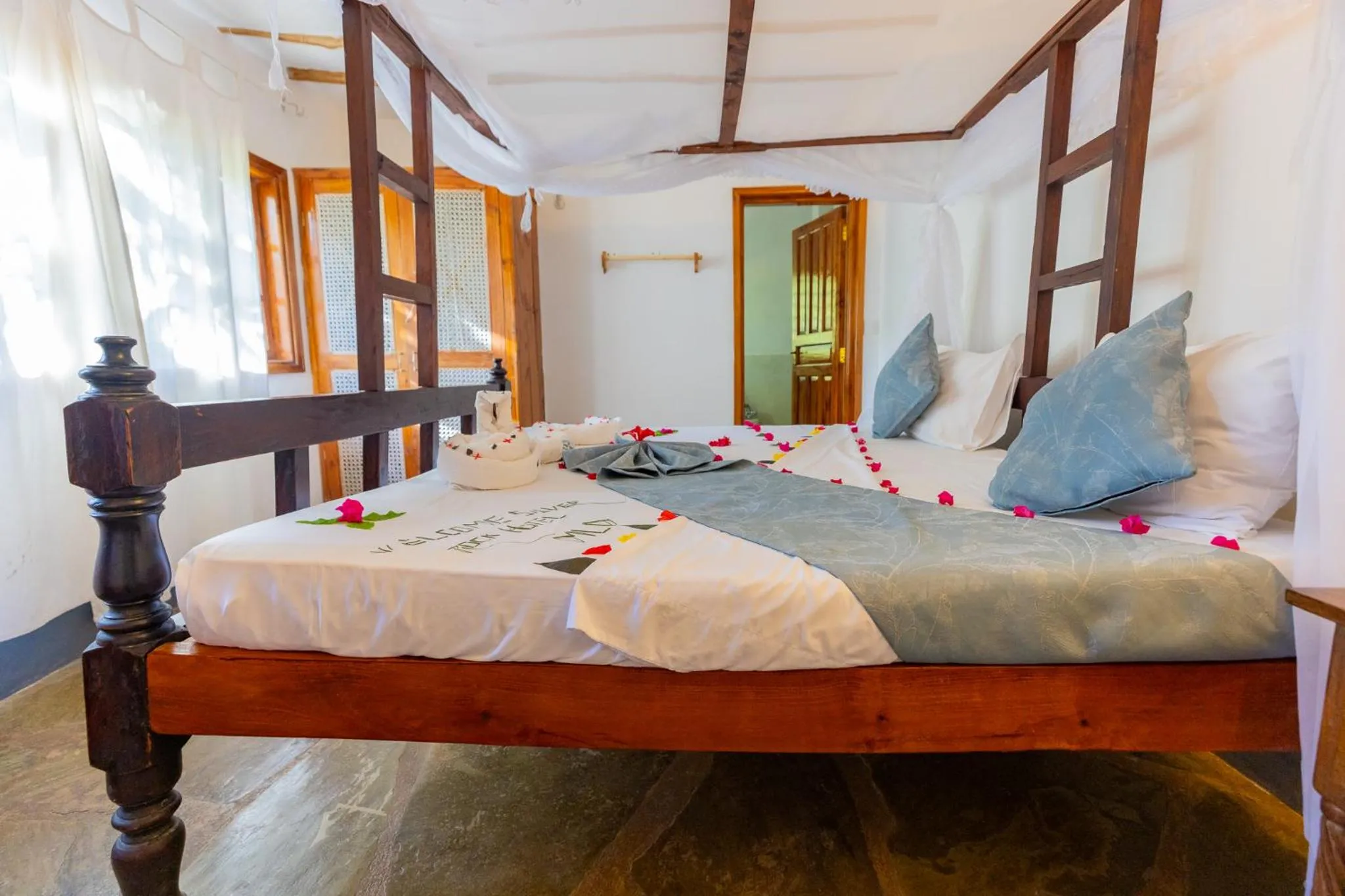 Bed in Silver Rock Boutique Resort by Mokawa - Hotel & Apartments