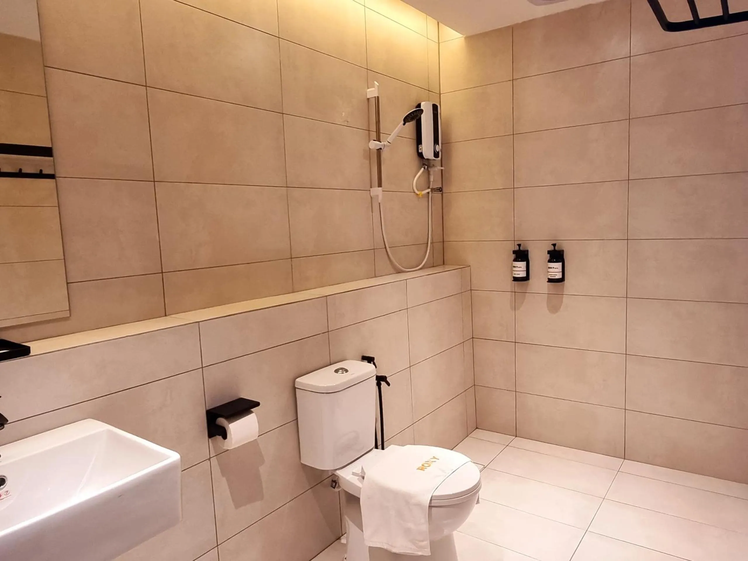 Bathroom in Roxy Hotel Malihah