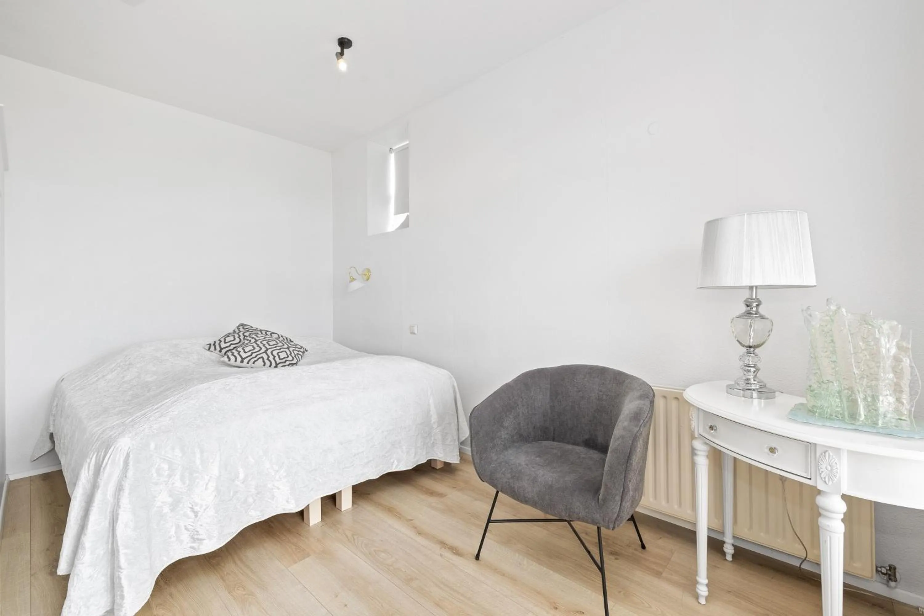 Bed in River Apartments