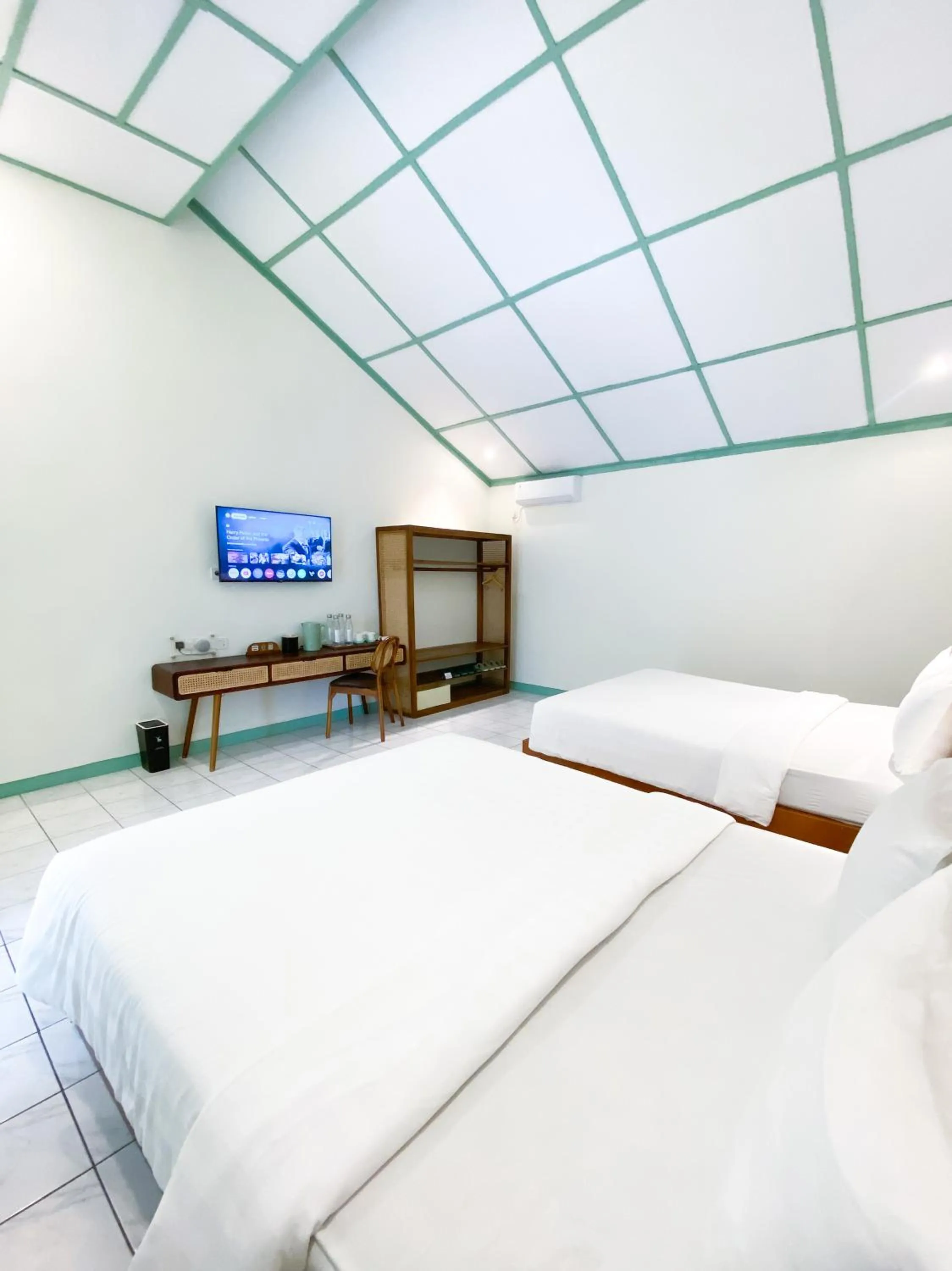 Bed in The Utara Hotel Tugu by Eresha Hospitality