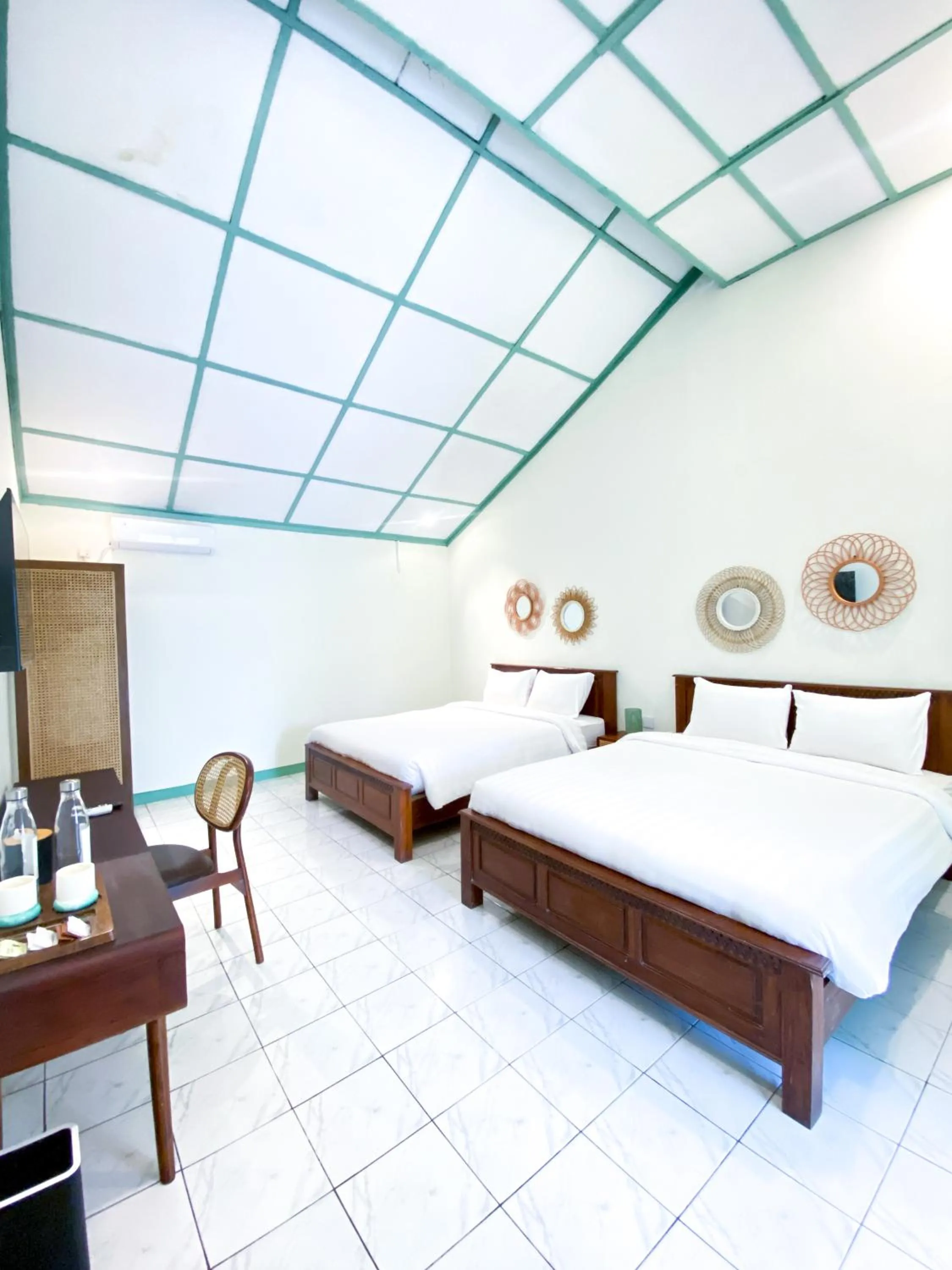 Bed in The Utara Hotel Tugu by Eresha Hospitality