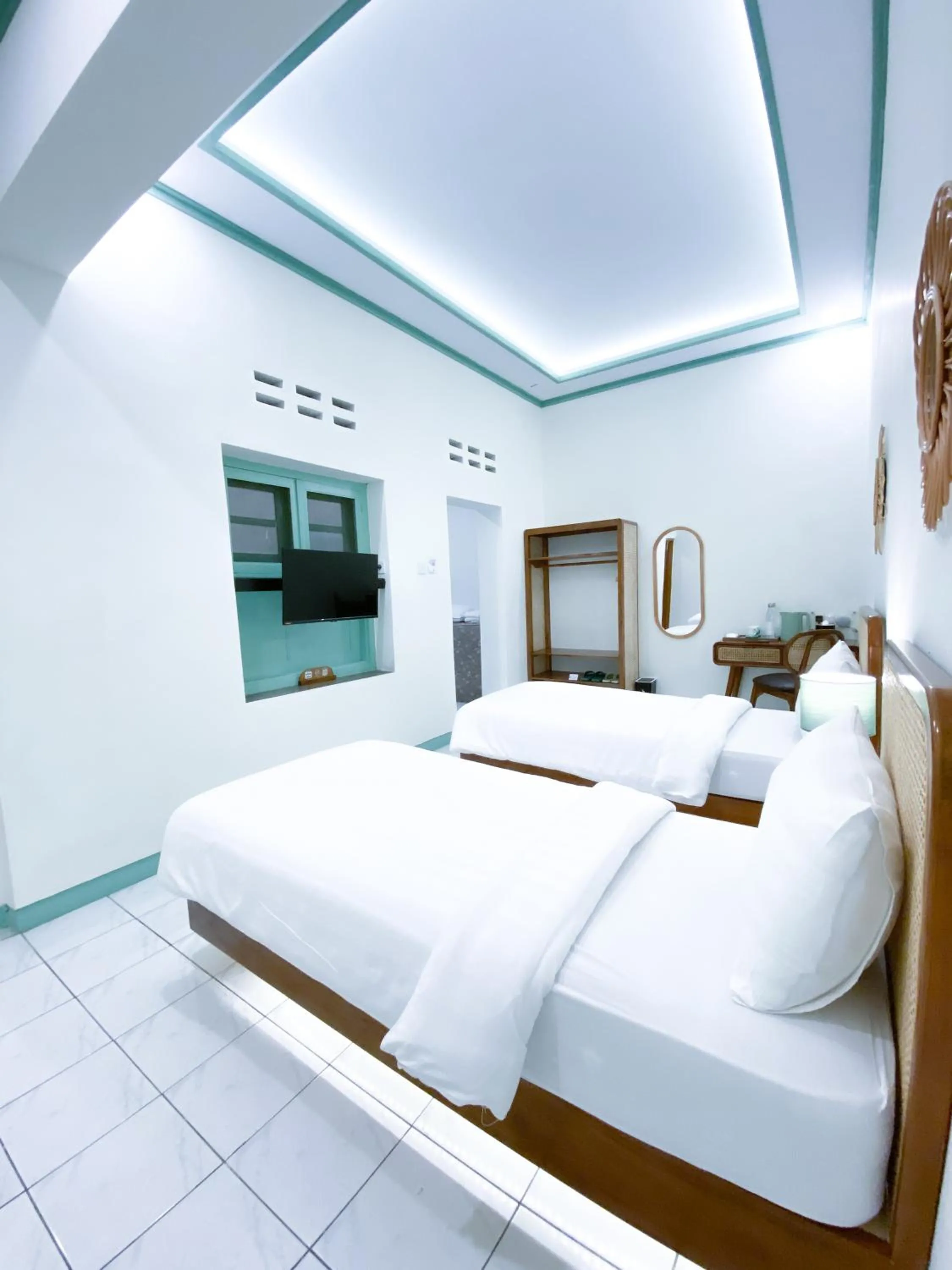 Bed in The Utara Hotel Tugu by Eresha Hospitality