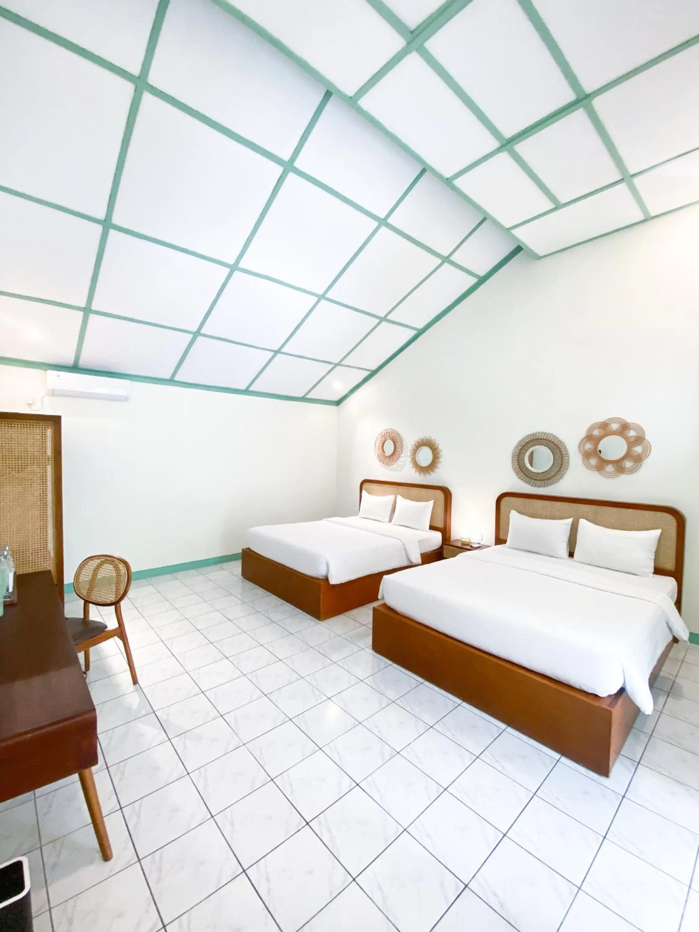 Bed in The Utara Hotel Tugu by Eresha Hospitality