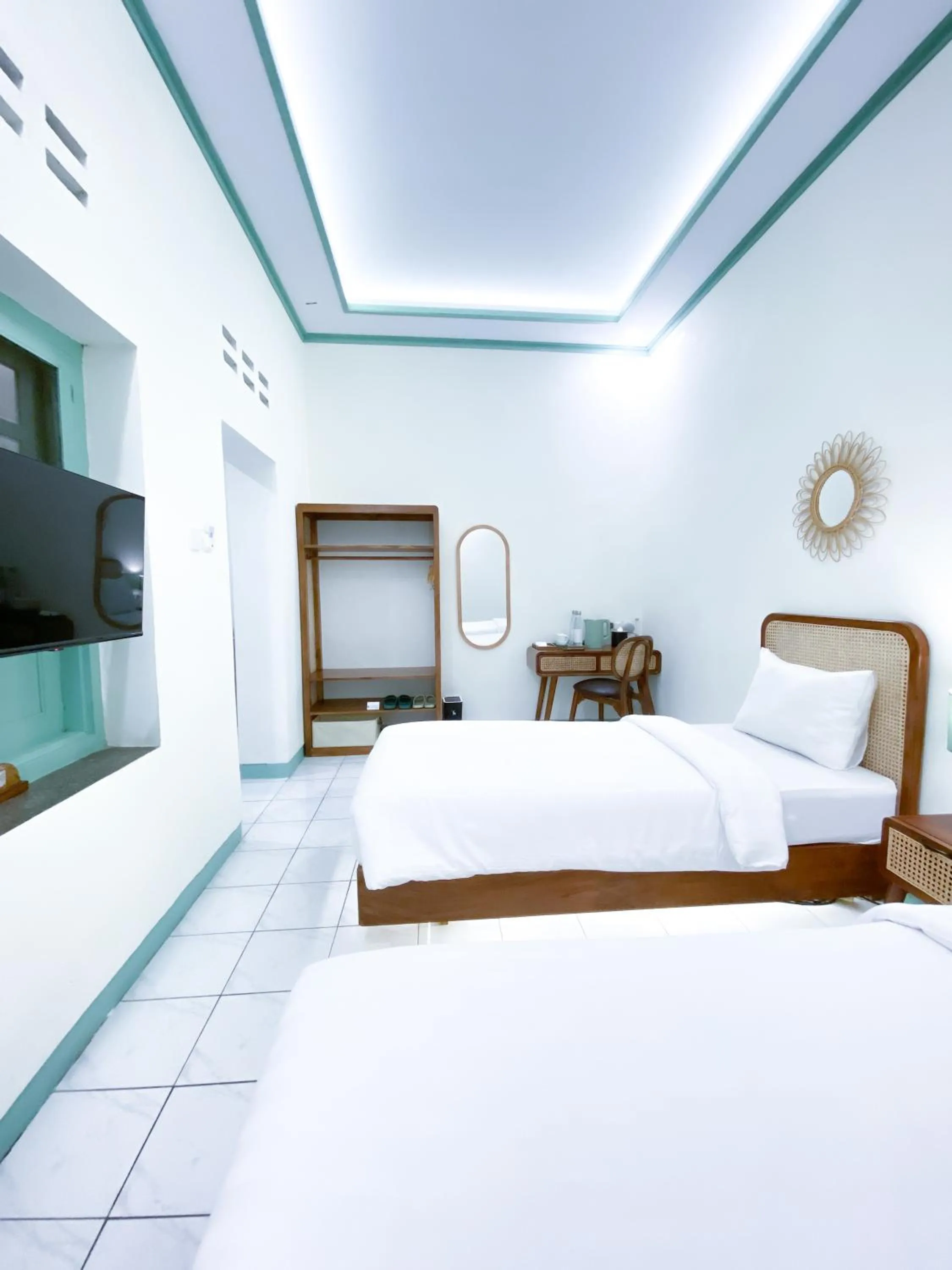 Bed in The Utara Hotel Tugu by Eresha Hospitality