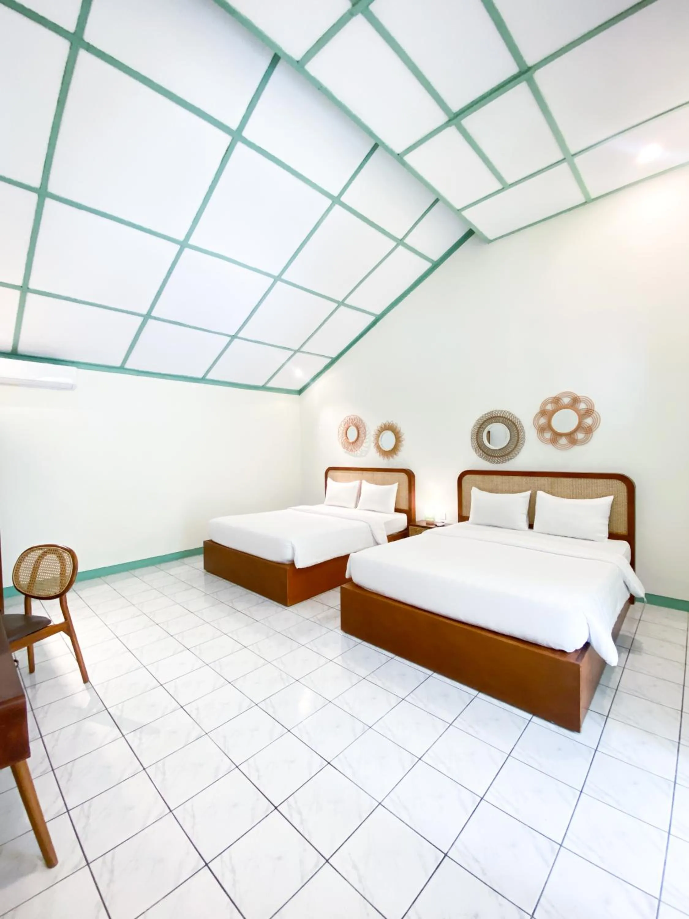 Bed in The Utara Hotel Tugu by Eresha Hospitality