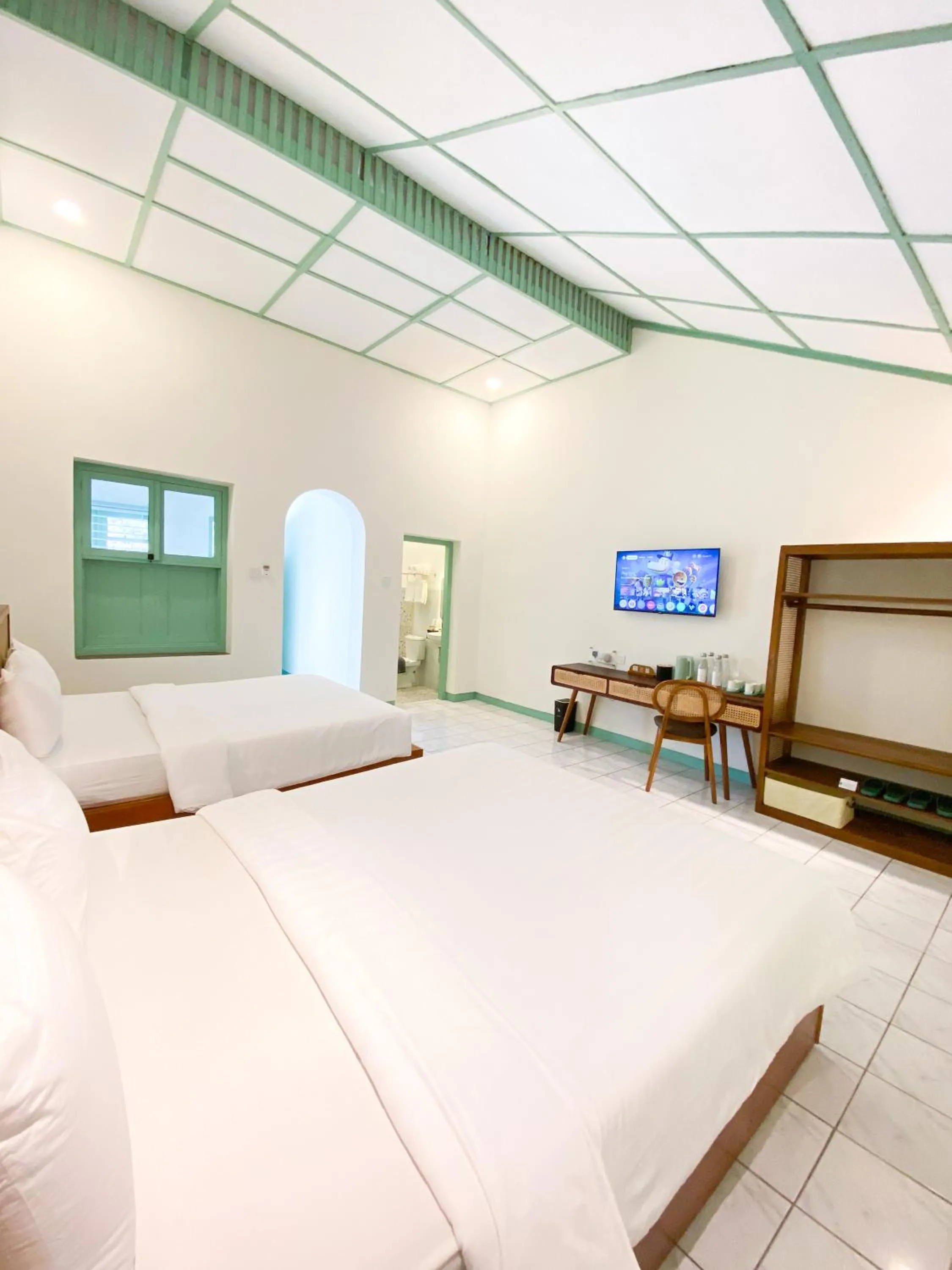 Bed in The Utara Hotel Tugu by Eresha Hospitality