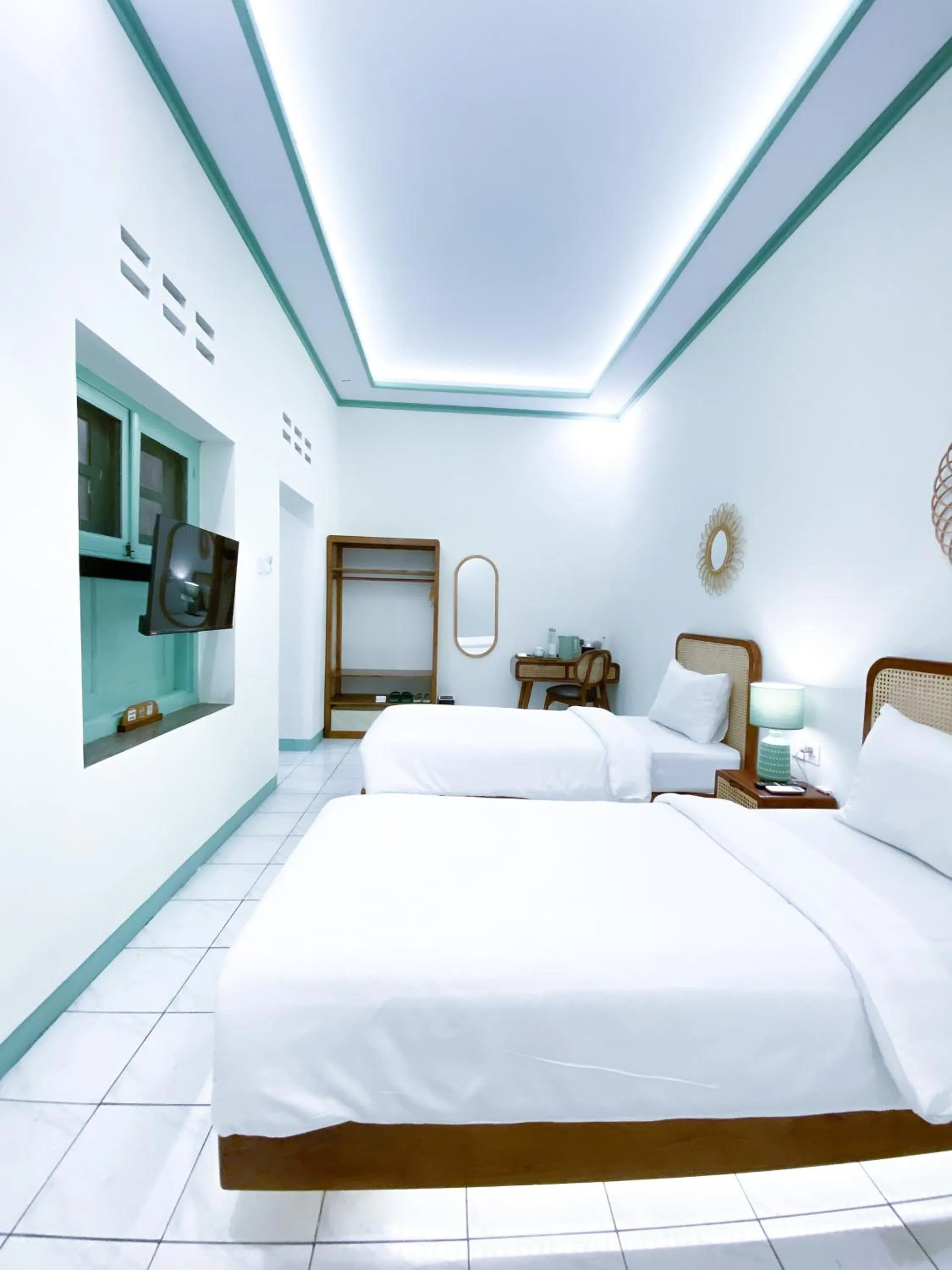 Bed in The Utara Hotel Tugu by Eresha Hospitality