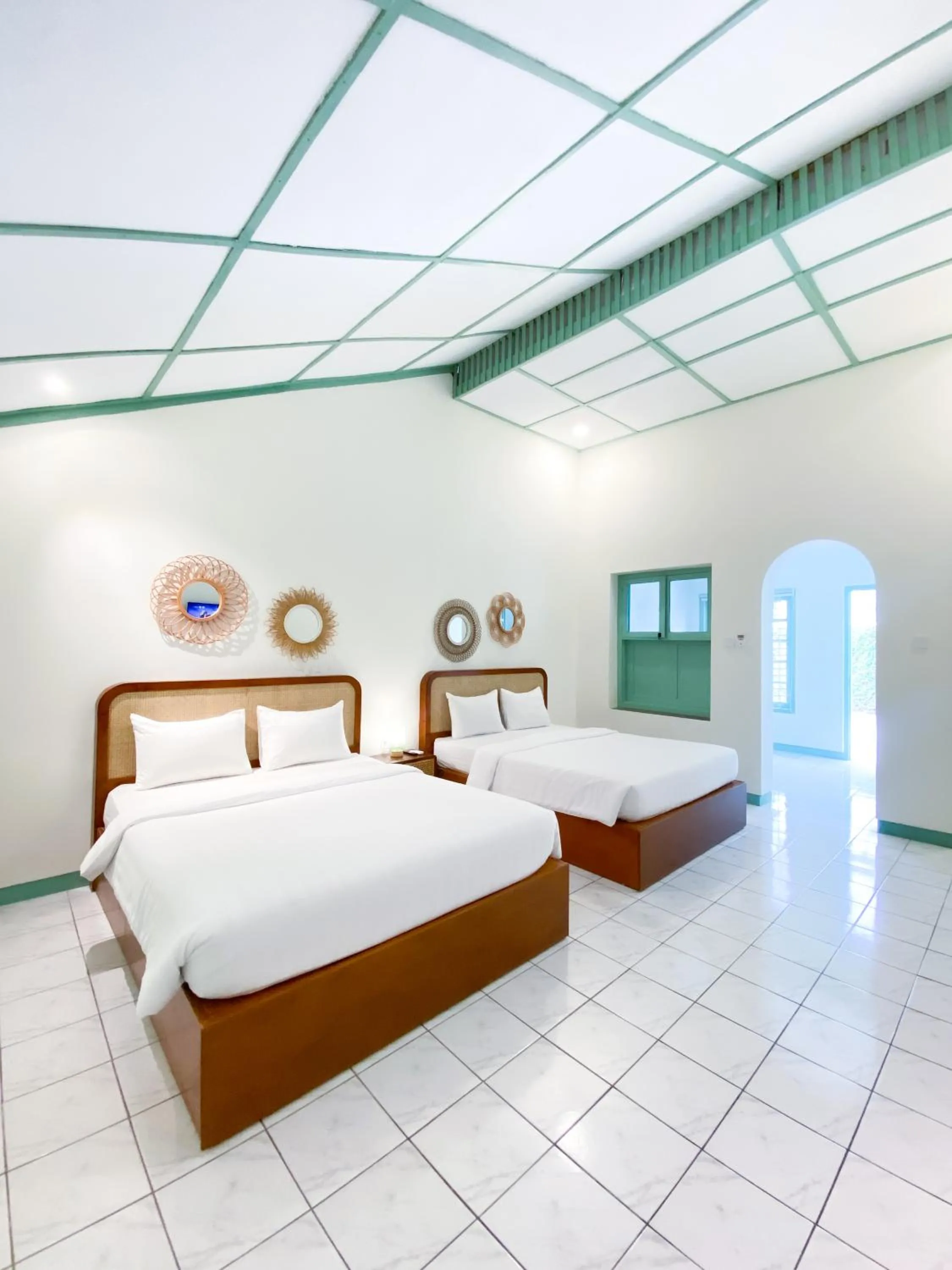 Bed in The Utara Hotel Tugu by Eresha Hospitality