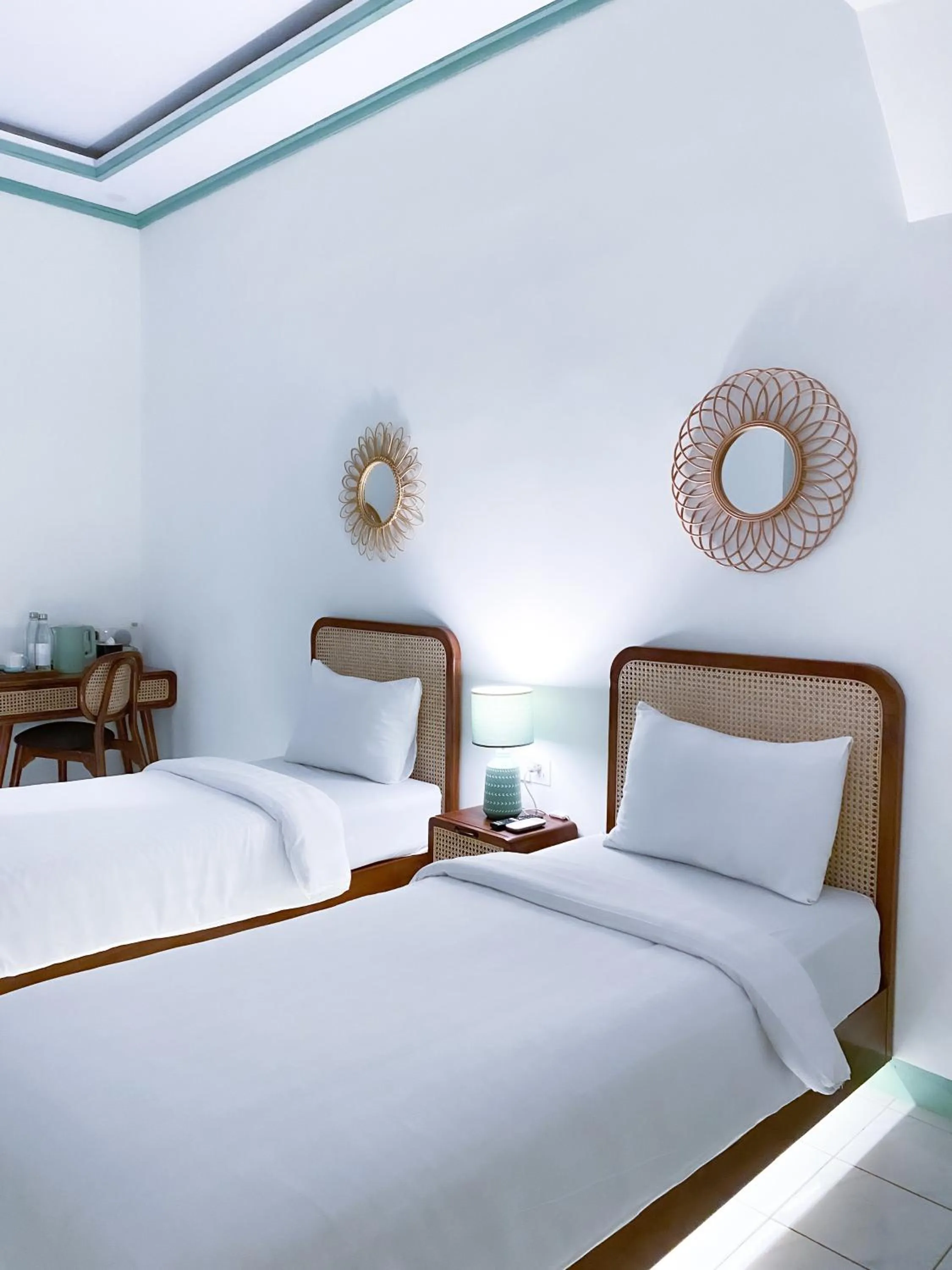Bed in The Utara Hotel Tugu by Eresha Hospitality