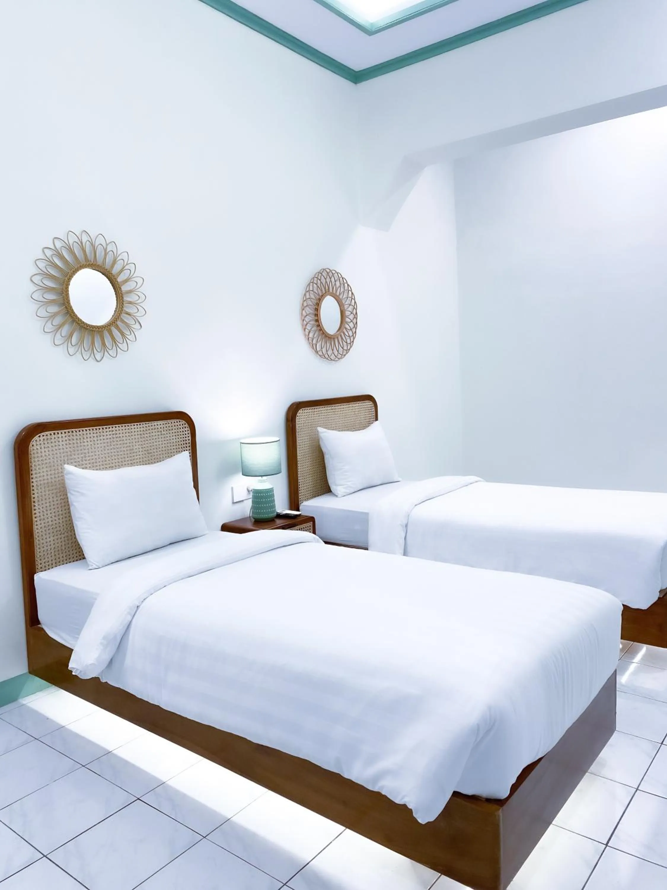 Bed in The Utara Hotel Tugu by Eresha Hospitality