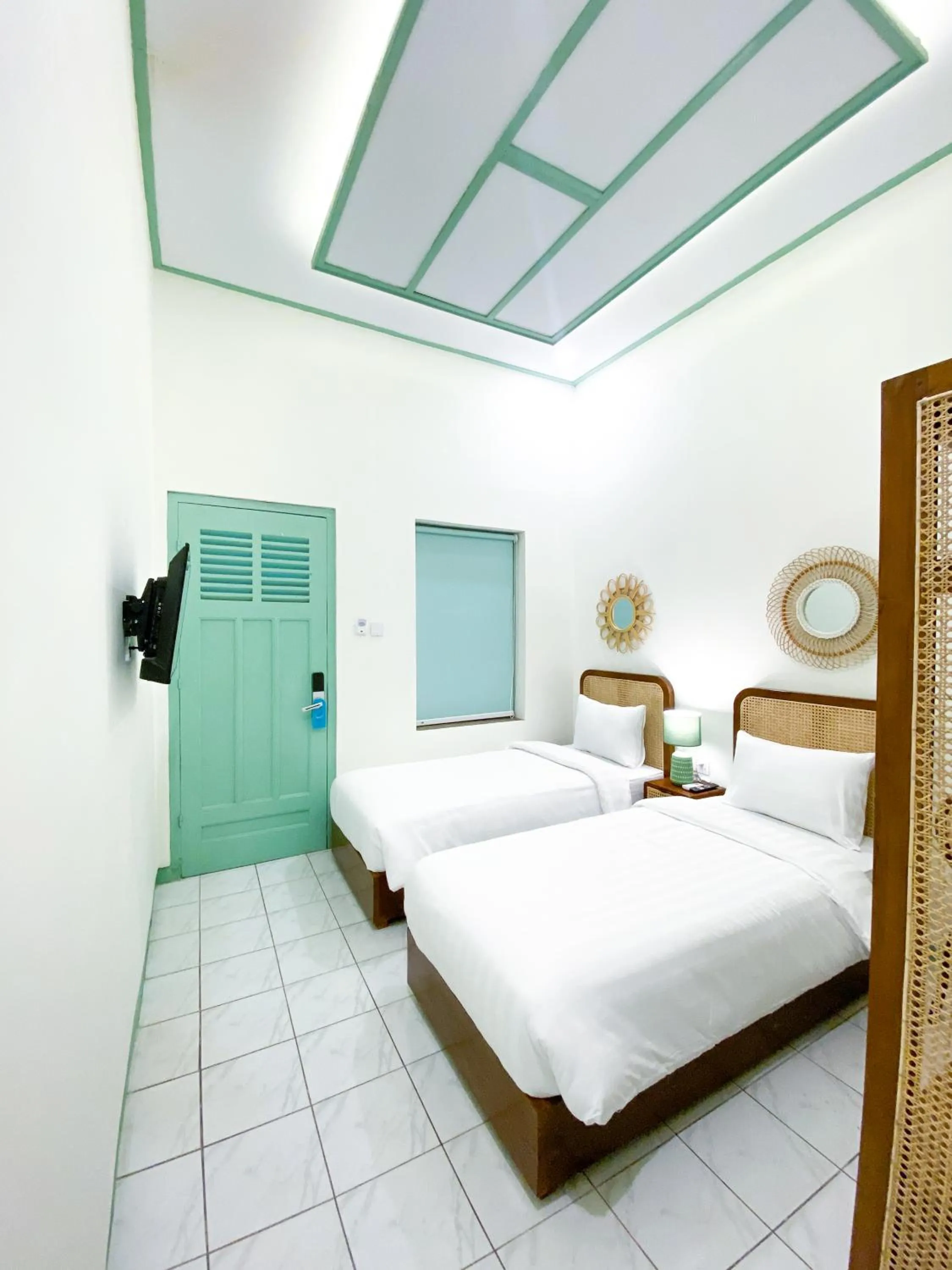 Bed in The Utara Hotel Tugu by Eresha Hospitality
