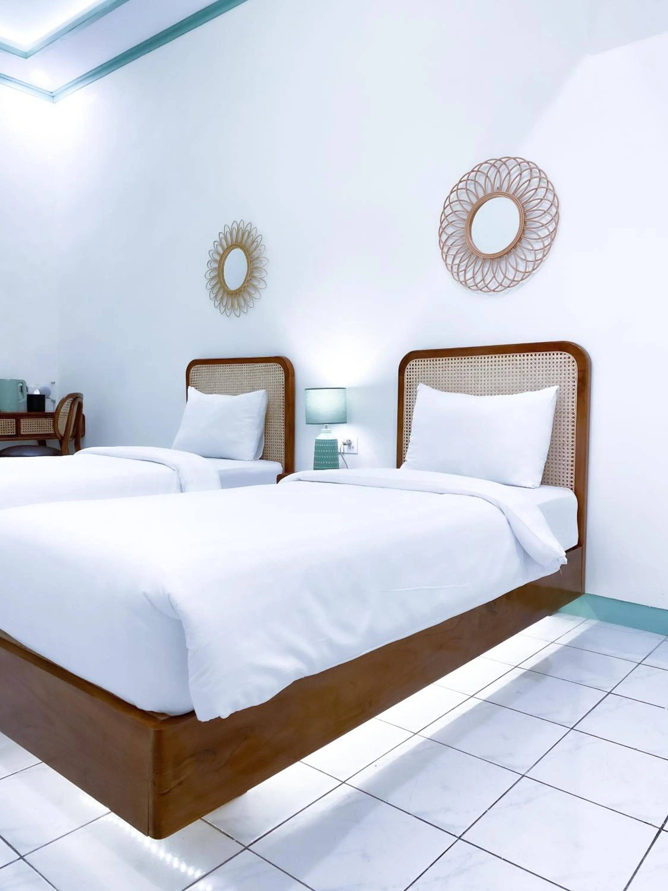Bed in The Utara Hotel Tugu by Eresha Hospitality