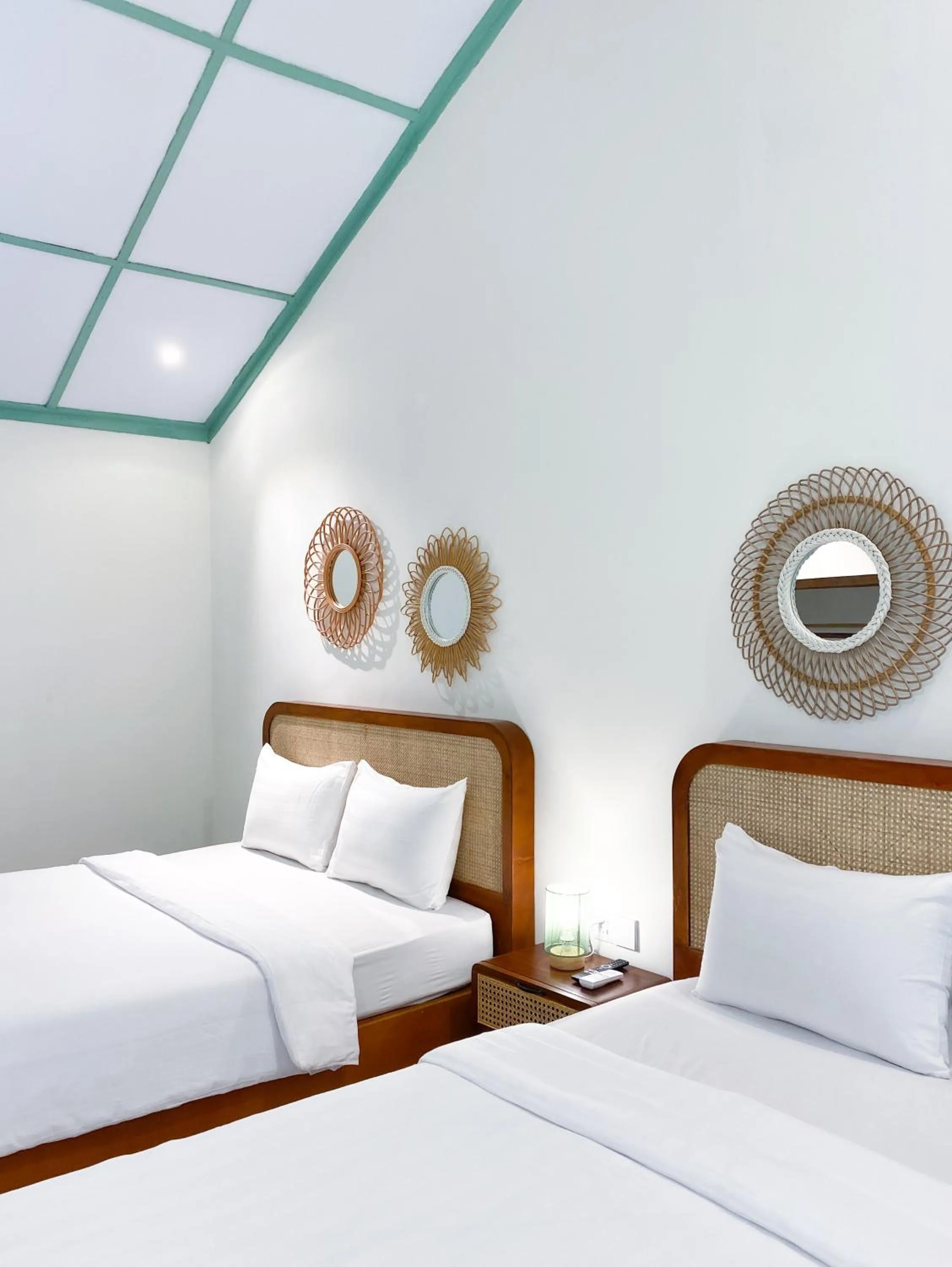 Bed in The Utara Hotel Tugu by Eresha Hospitality