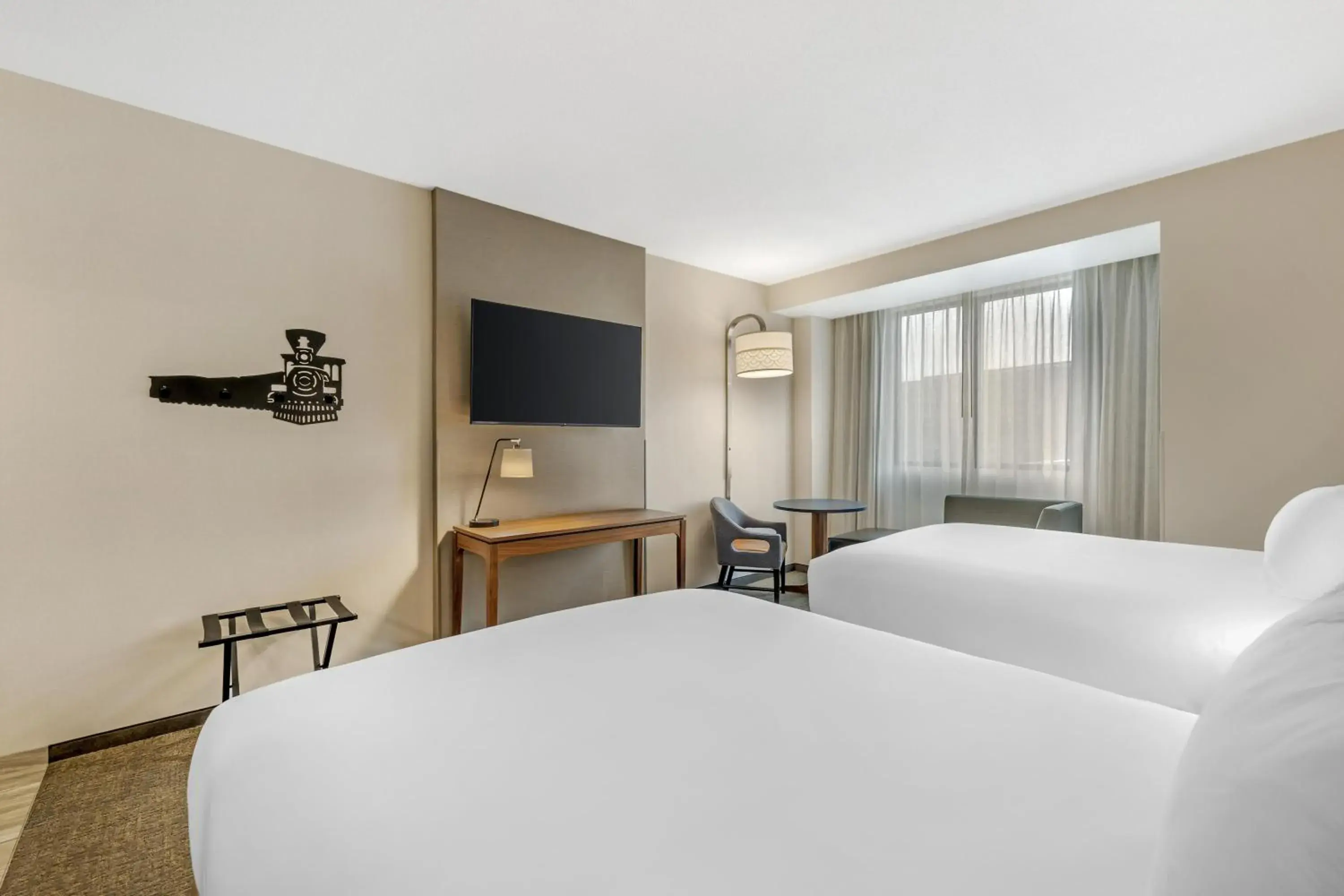 Upper Floor Deluxe Room with Two Queen Beds - Hearing Accessible in Drury Plaza Hotel Lincoln Downtown Upper Floor Deluxe Room with Two Queen Beds - Hearing Accessible in Drury Plaza Hotel Lincoln Downtown