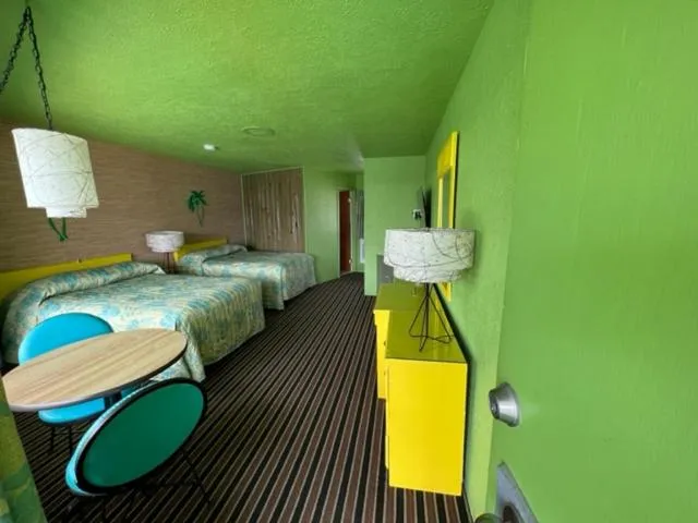 Bed in Caribbean Motel