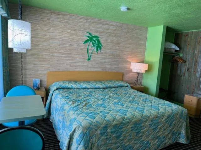 Bed in Caribbean Motel
