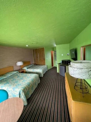 Bed in Caribbean Motel