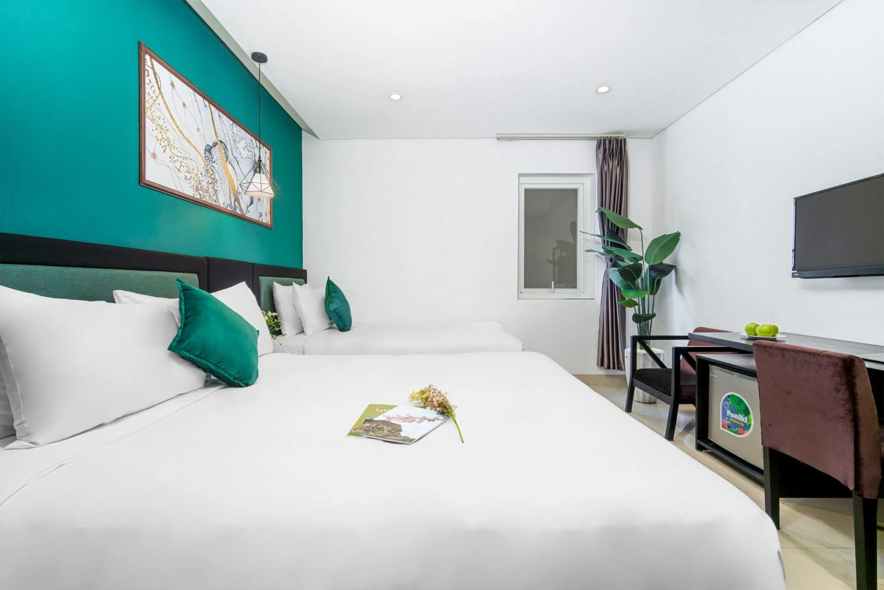 Bed in ELC Beach Hotel