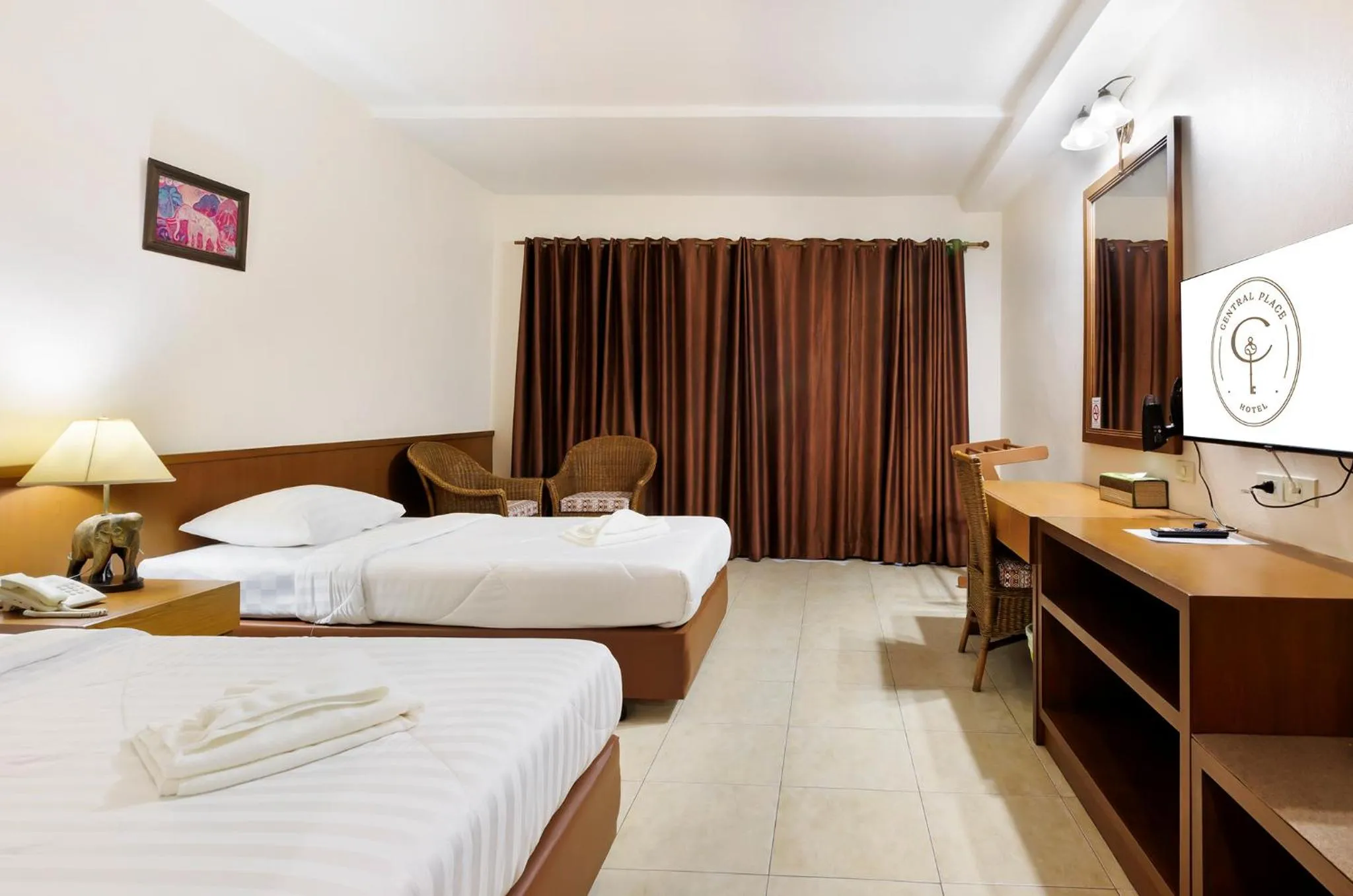 Photo of the whole room, Bed in Central Place Hotel