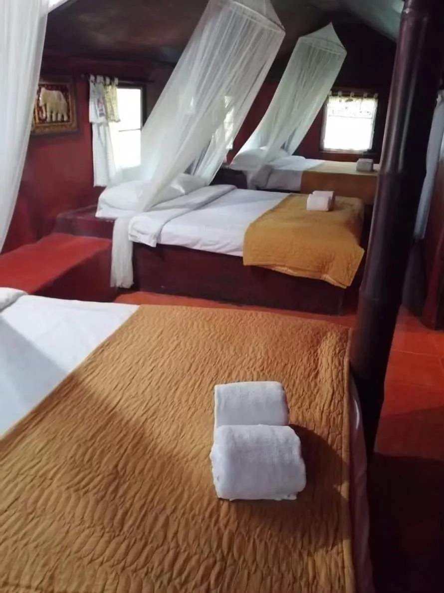 Bed in Ban Din Resort Chiang Rai