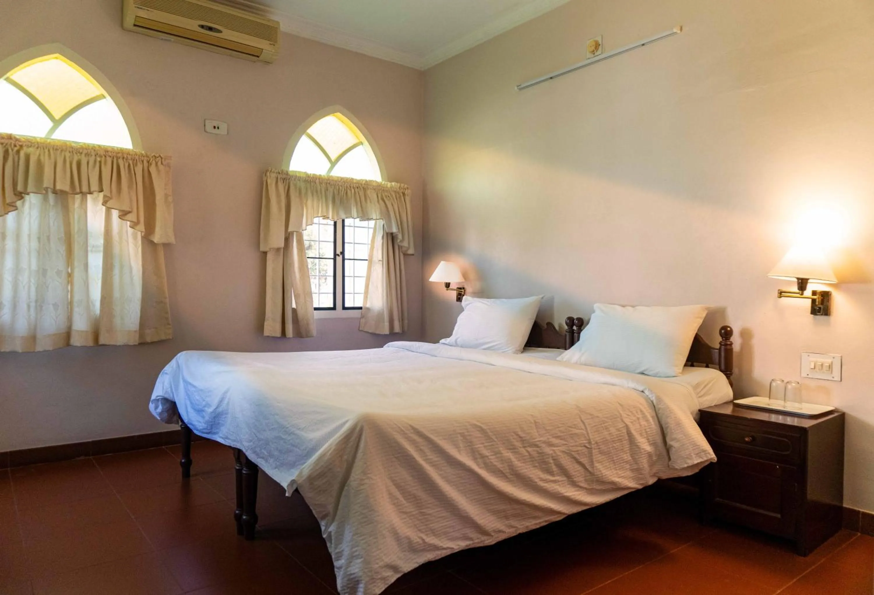 Bed in Gama Heritage Residency