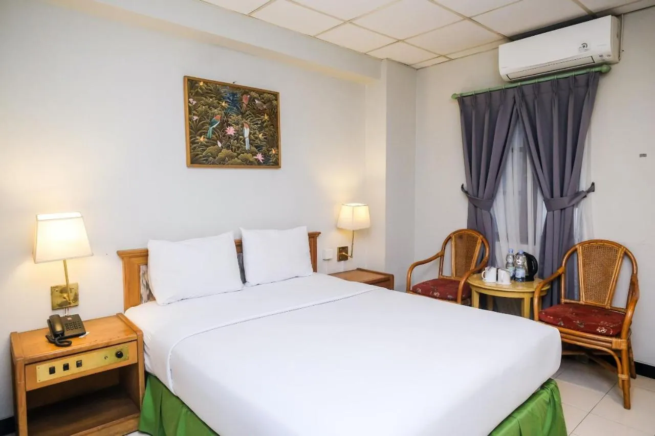 Bed in Hotel Surya Asia