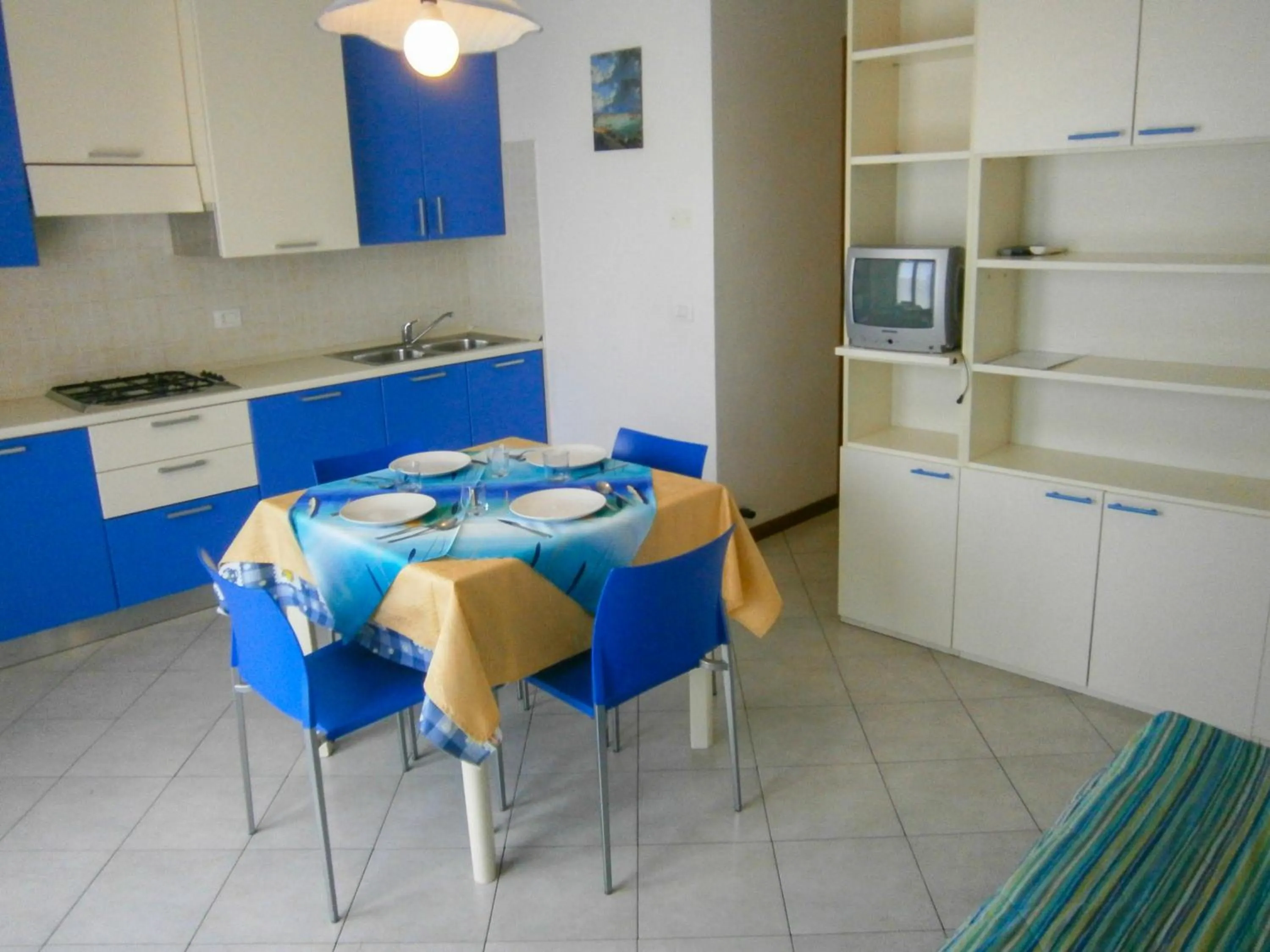 Kitchen or kitchenette in Villaggio dei Fiori - Agenzia Cocal