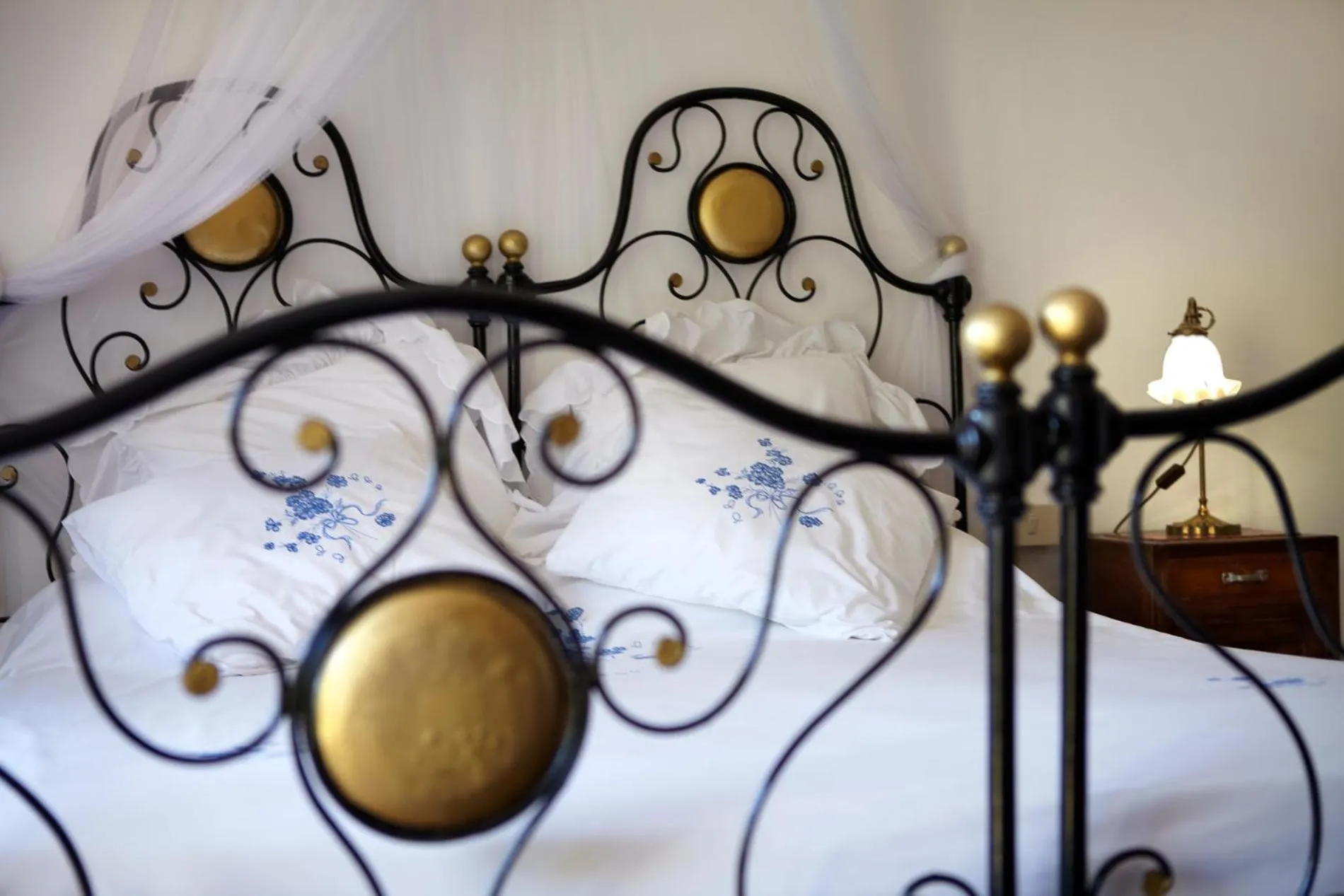 Decorative detail, Bed in Antico Borgo Sanda Lago Maggiore